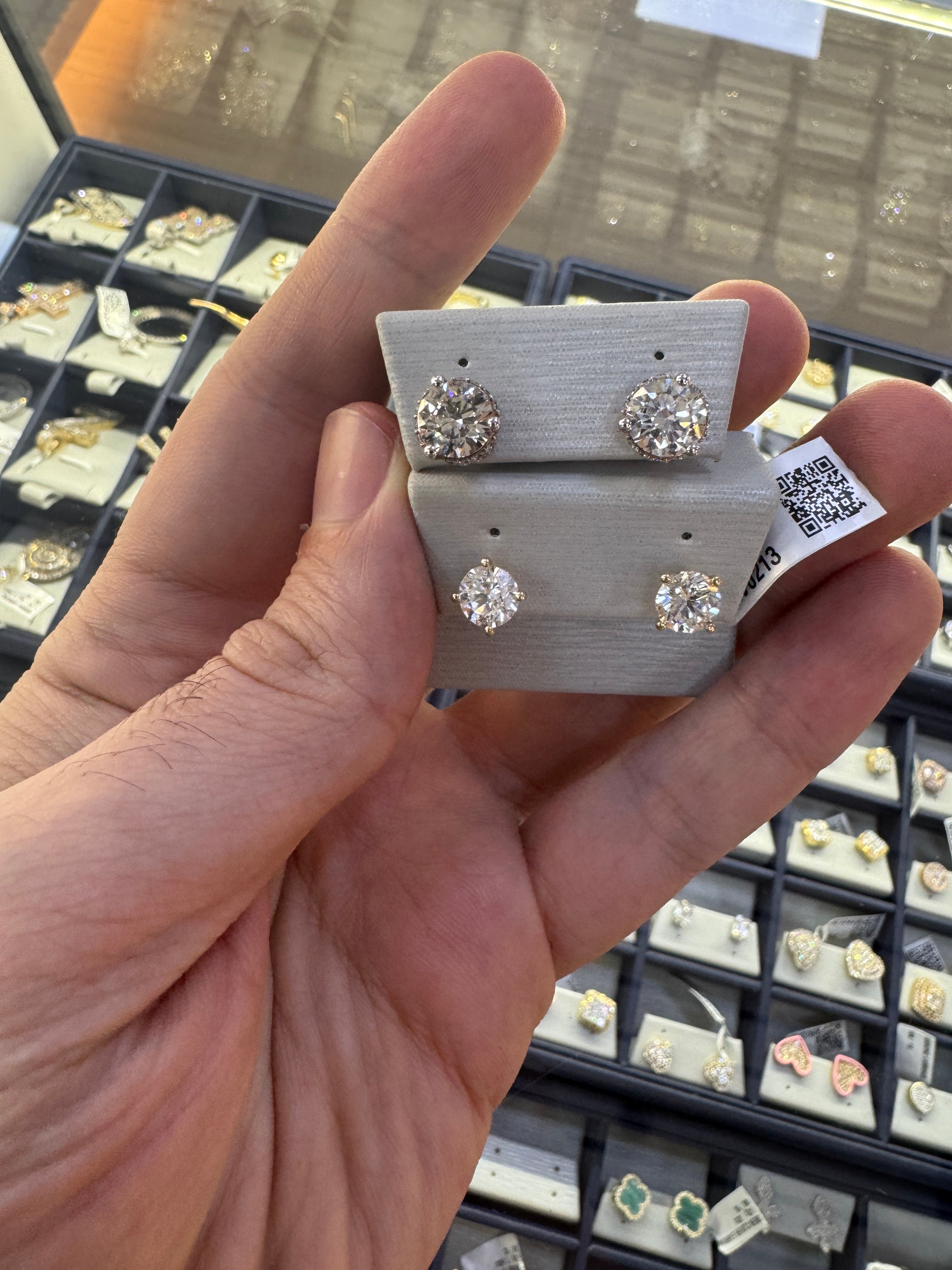 2 pair of diamond earrings