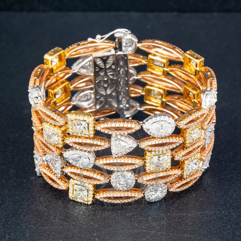 18K GOLD TRICOLOR BANGLE WITH A VARIETY OF DIFFERENT DIAMONDS 29.57 CT