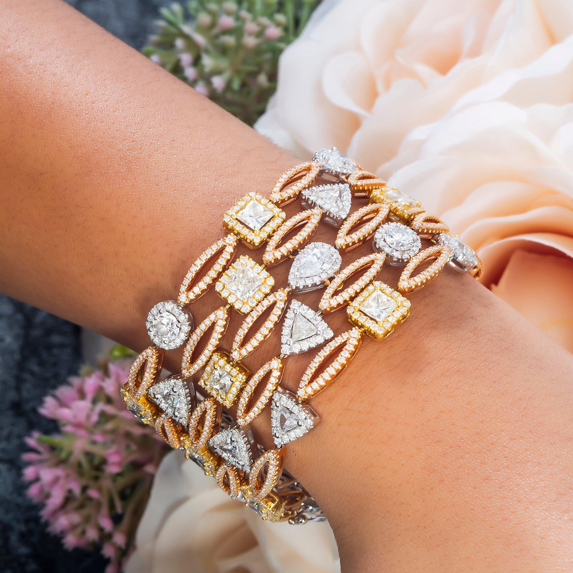 18K GOLD TRICOLOR BANGLE WITH A VARIETY OF DIFFERENT DIAMONDS 29.57 CT