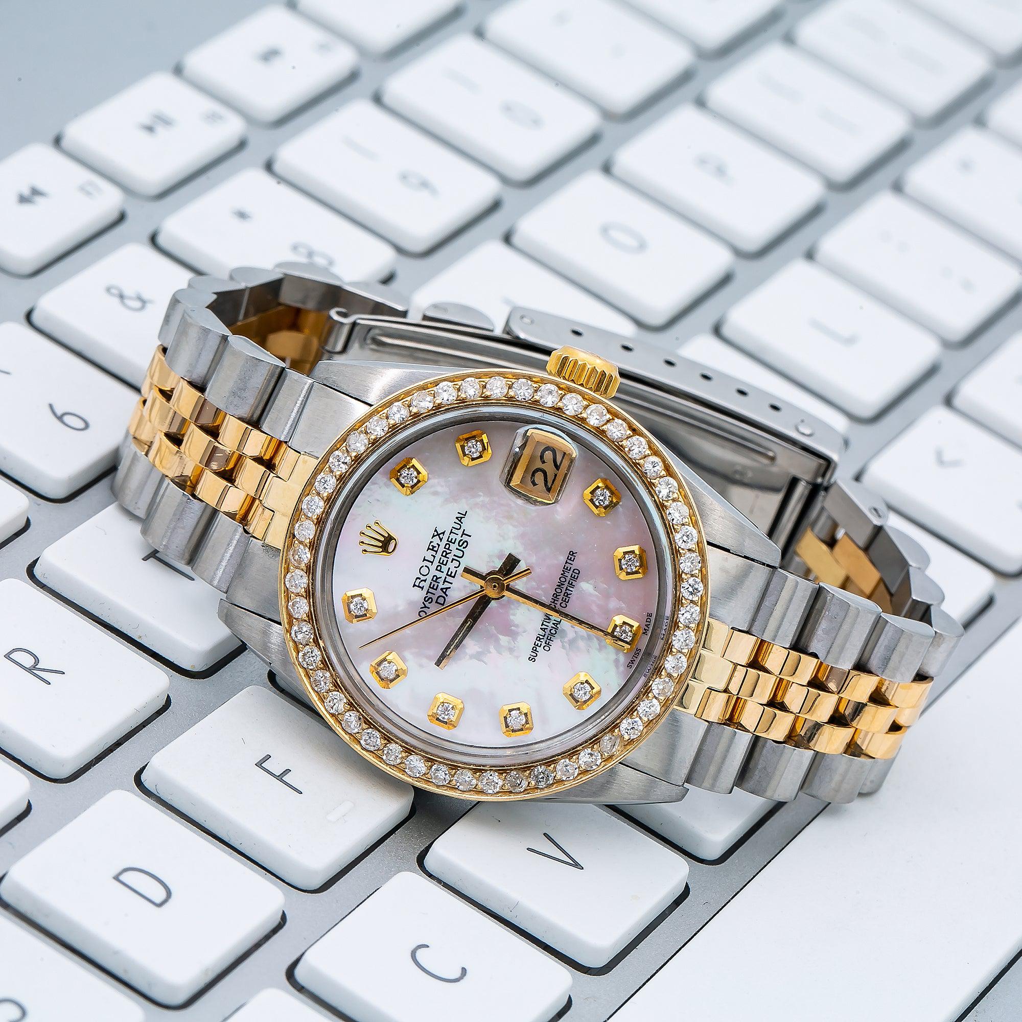 Rolex Datejust 31MM 6824 Pink Mother of Pearl Diamond Dial Diamond Bezel Two Tone Yellow Gold Jubilee Bracelet