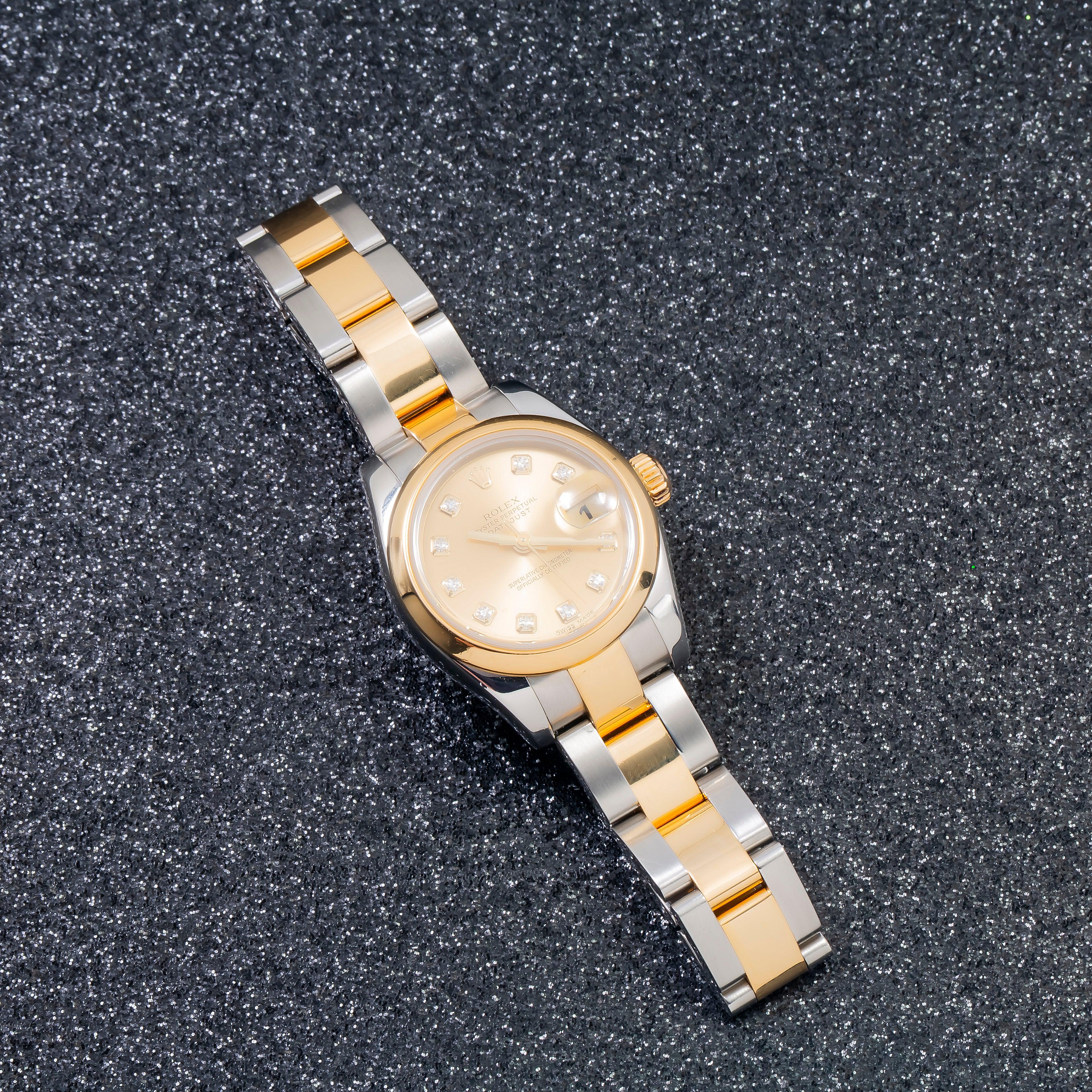 Rolex Datejust 26MM 179163 Champagne Diamond Dial Smooth Bezel Two Tone Yellow Gold Oyster Bracelet