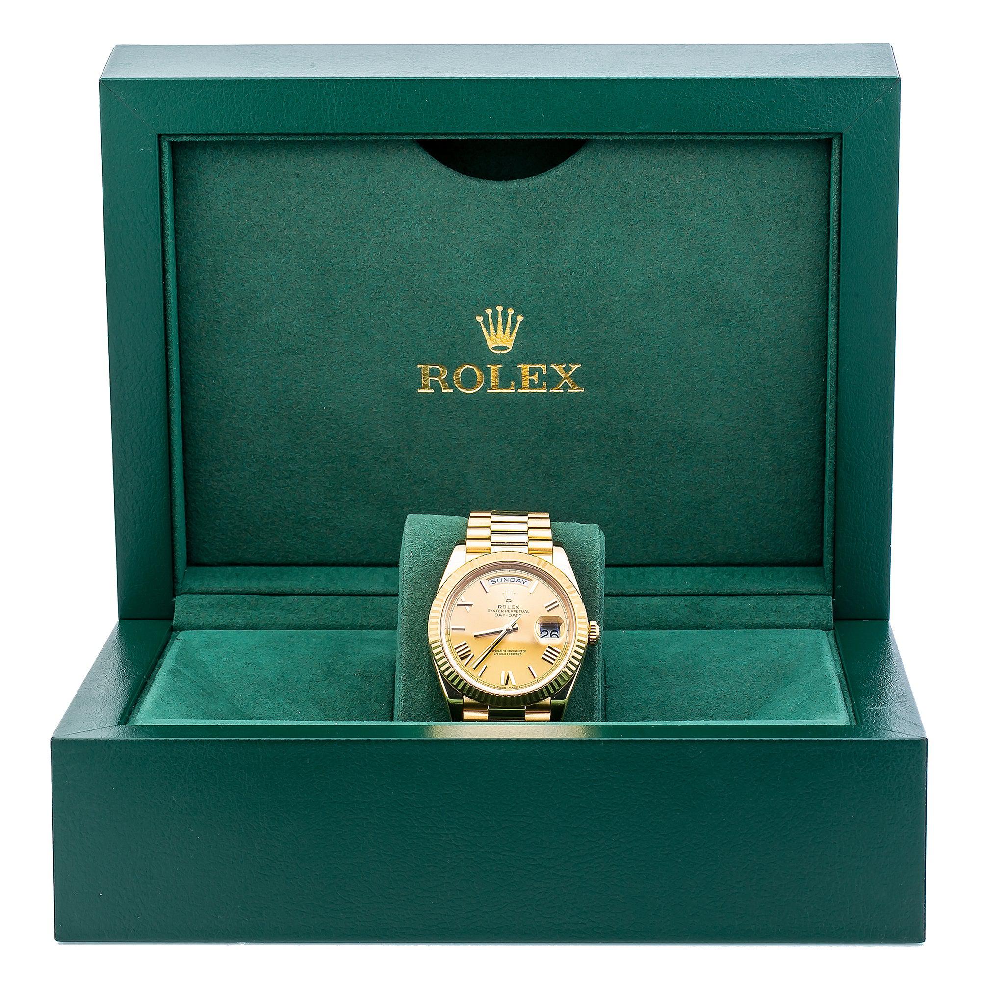 Rolex Day-Date 40MM 228238 Champagne Roman Dial Fluted Bezel 18K Yellow Gold President Bracelet