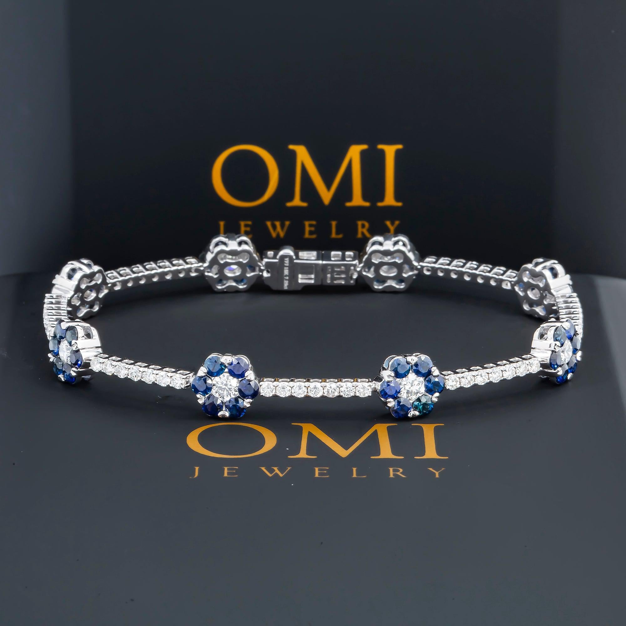18K GOLD ROUND DIAMOND AND BLUE SAPPHIRE GEMSTONE FLOWER TENNIS BRACELET 8.03 CTW