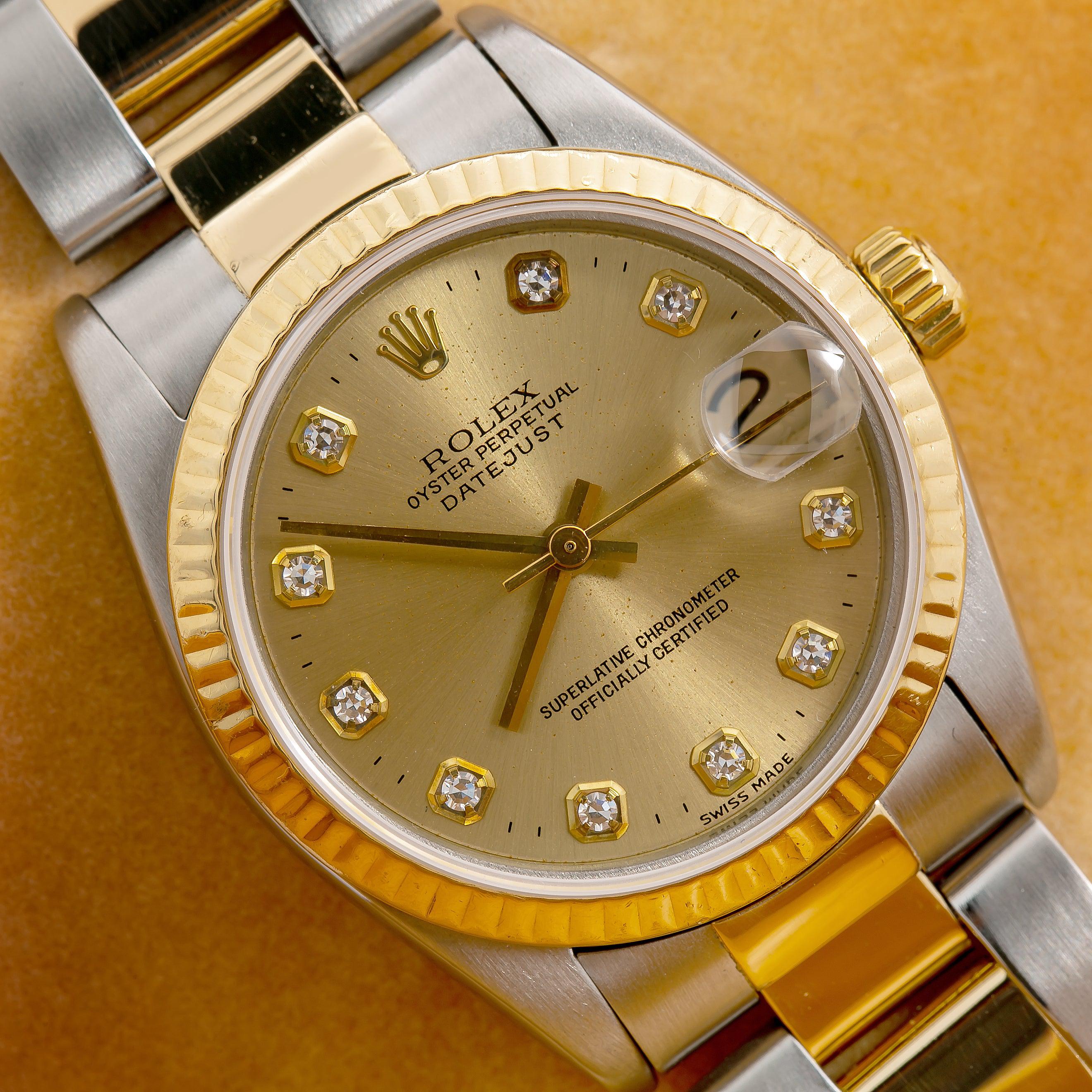 Rolex Datejust 31MM 6824 Champagne Diamond Dial Fluted Bezel Two Tone Yellow Gold Oyster Bracelet
