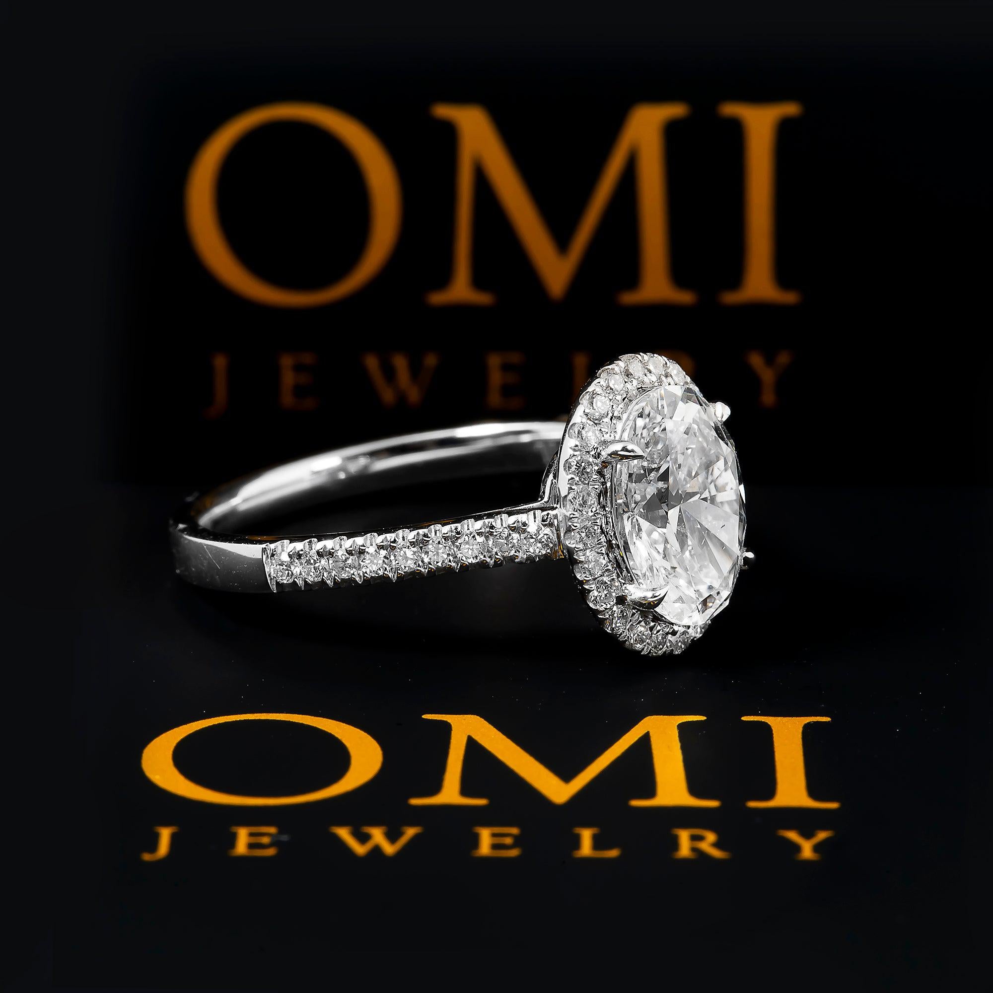 18K GOLD HALO OVAL LAB DIAMOND RING 2.43 CTW