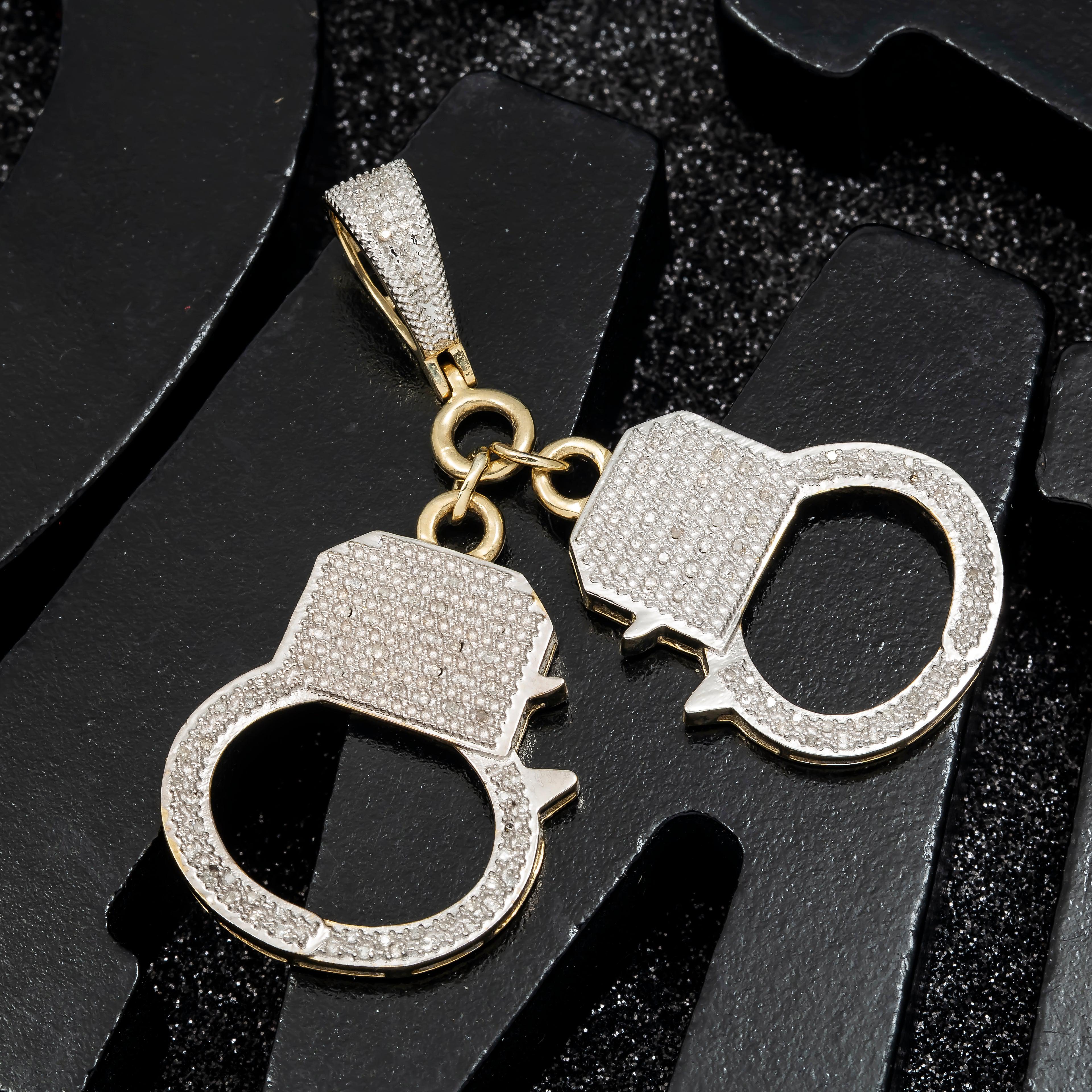 10K GOLD DIAMOND HANDCUFFS PENDANT 0.47 CT
