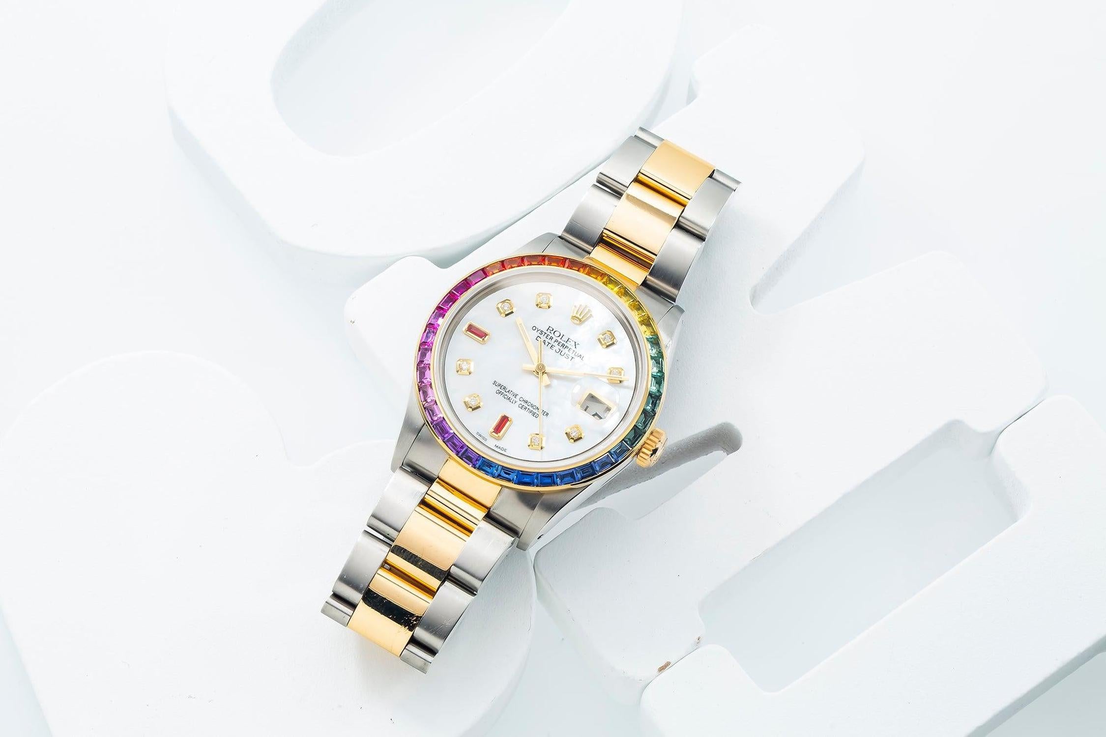 Rolex Datejust 36MM 16013 White Mother of Pearl Diamond Dial Rainbow Gemstone Bezel Two Tone Yellow Gold Oyster Bracelet