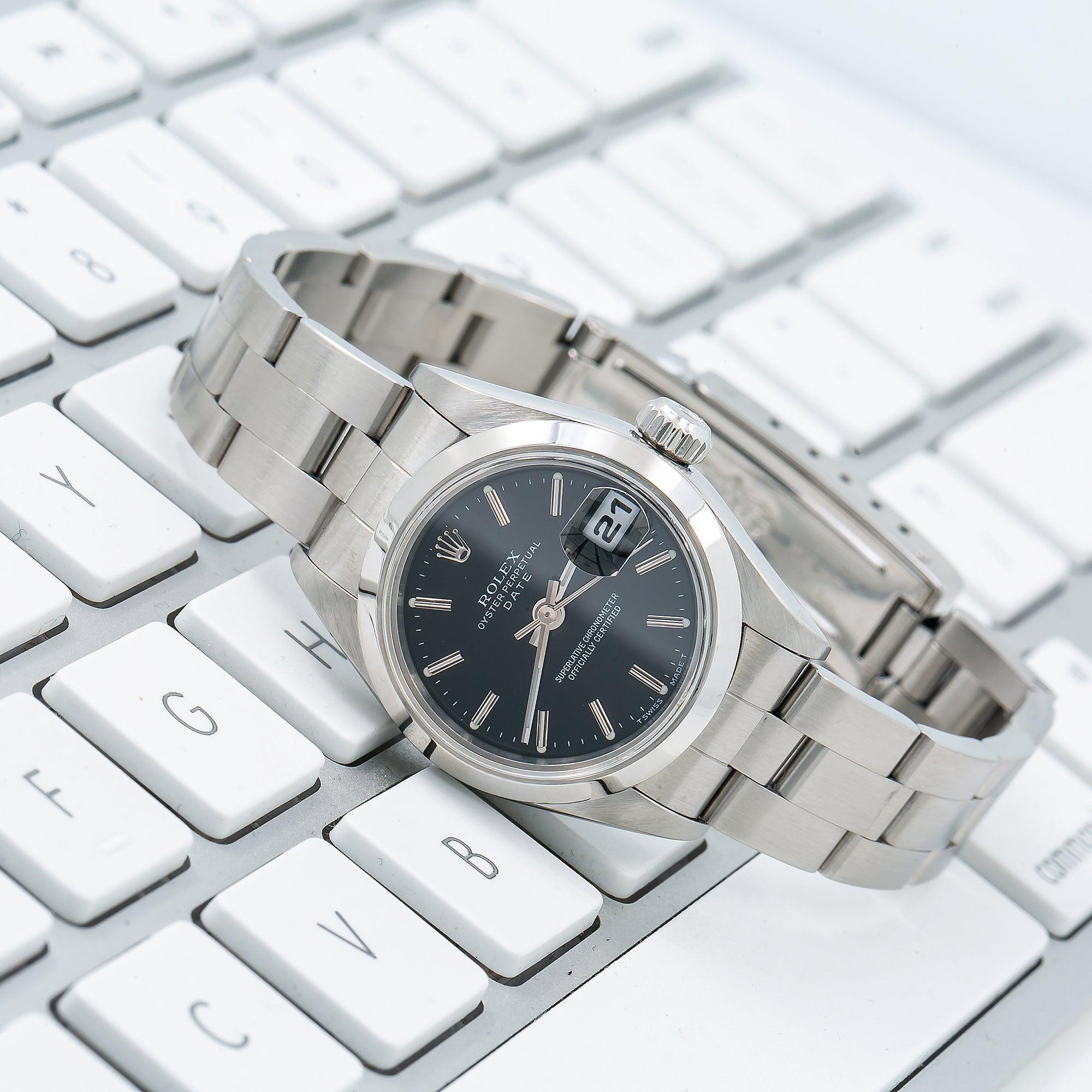 Rolex Date 26MM 6916 Black Dial Smooth Bezel Stainless Steel Oyster Bracelet