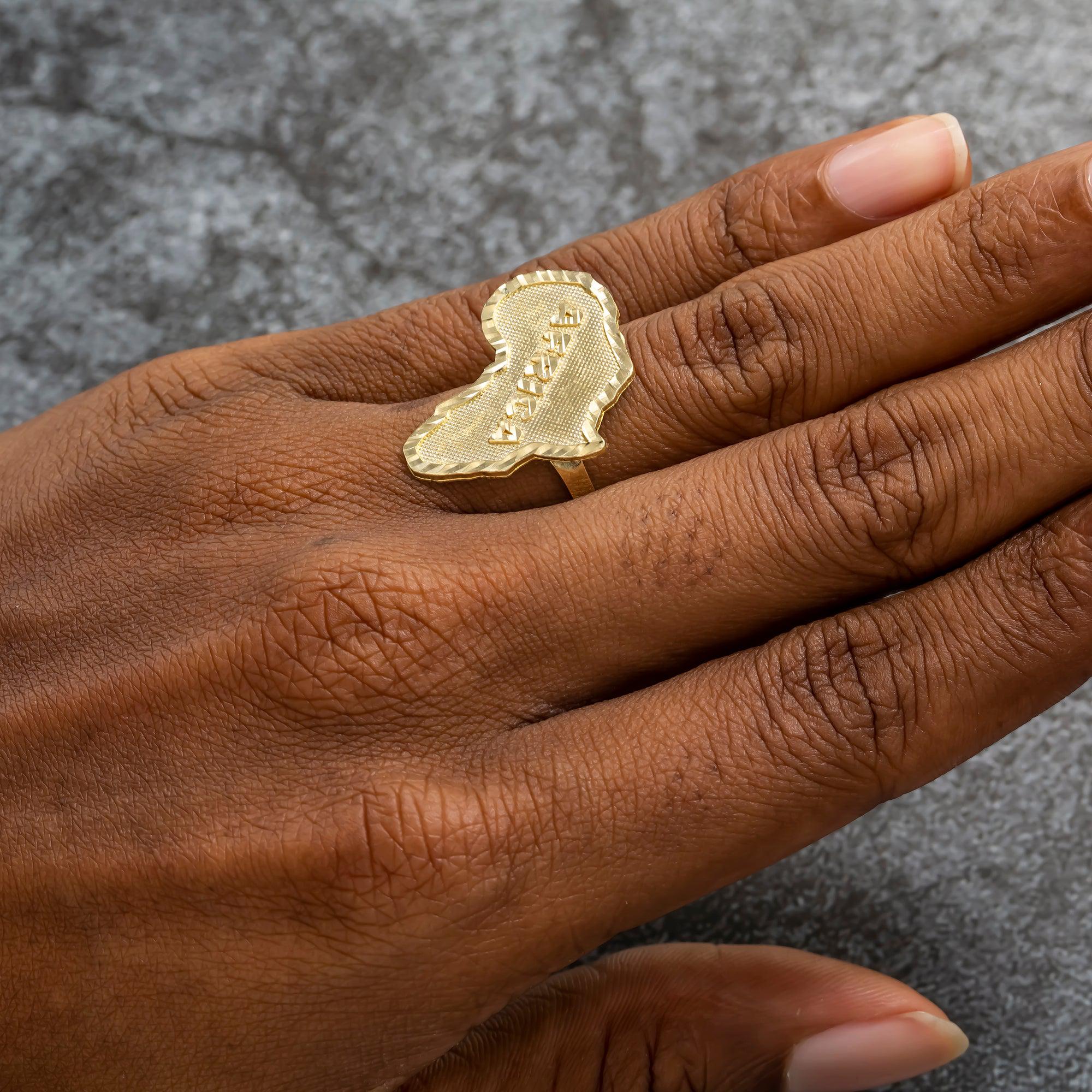 10K GOLD AFRICA RING 3.8G