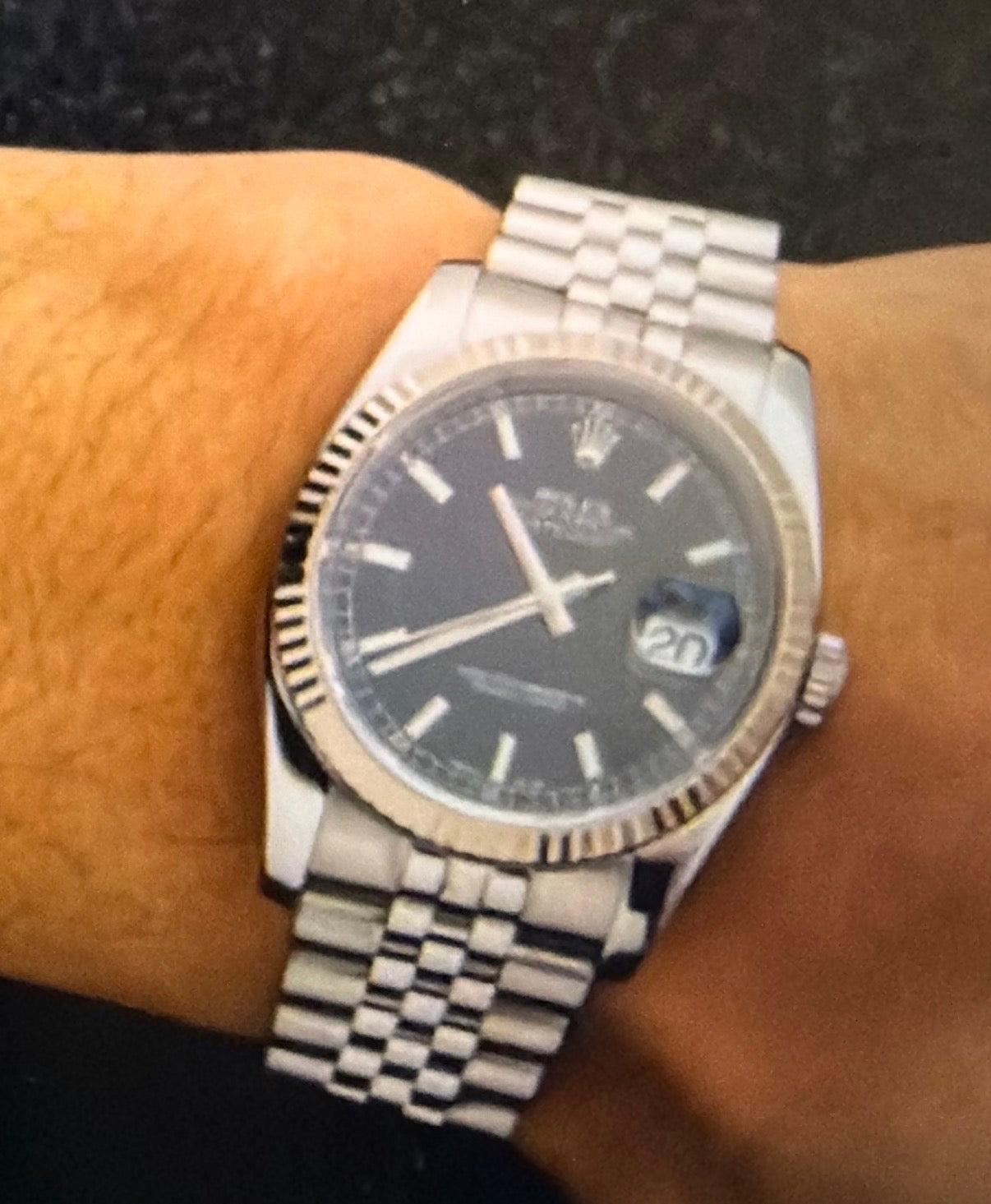 P serial Rolex with black dial and fluted bezel