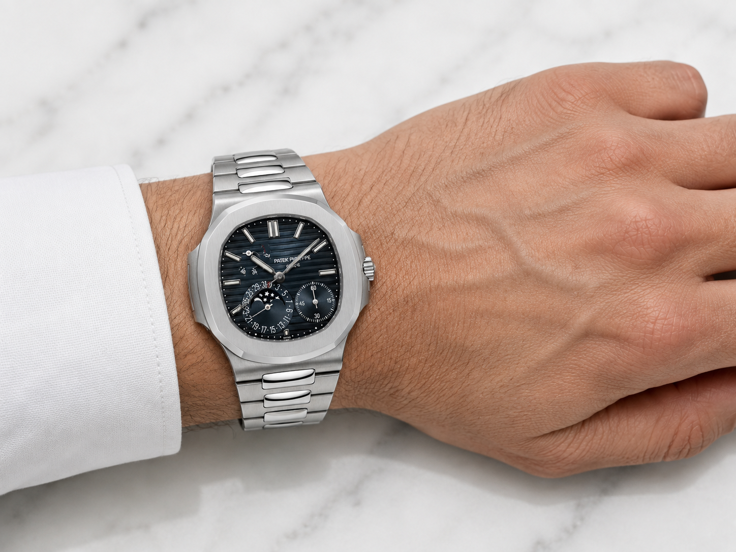 PATEK PHILIPPE NAUTILUS 5712/1A-001 BLUE DIAL STAINLESS STEEL MEN’S WATCH