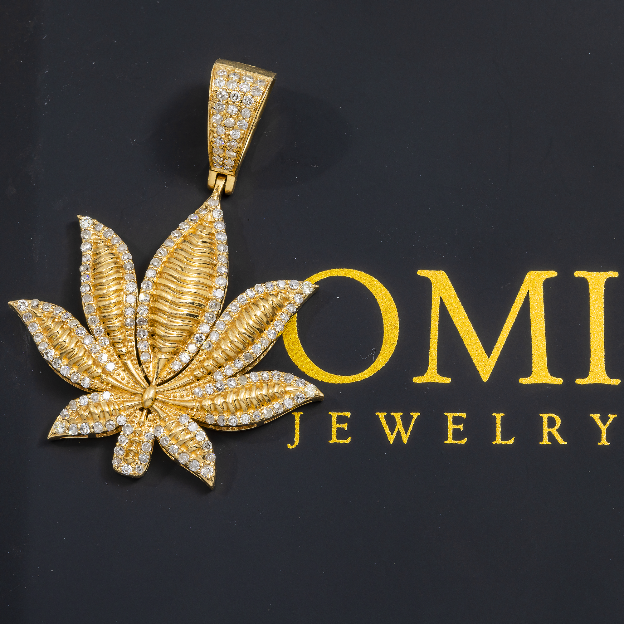 14K GOLD DIAMOND CANNABIS LEAF PENDANT 0.68 CT