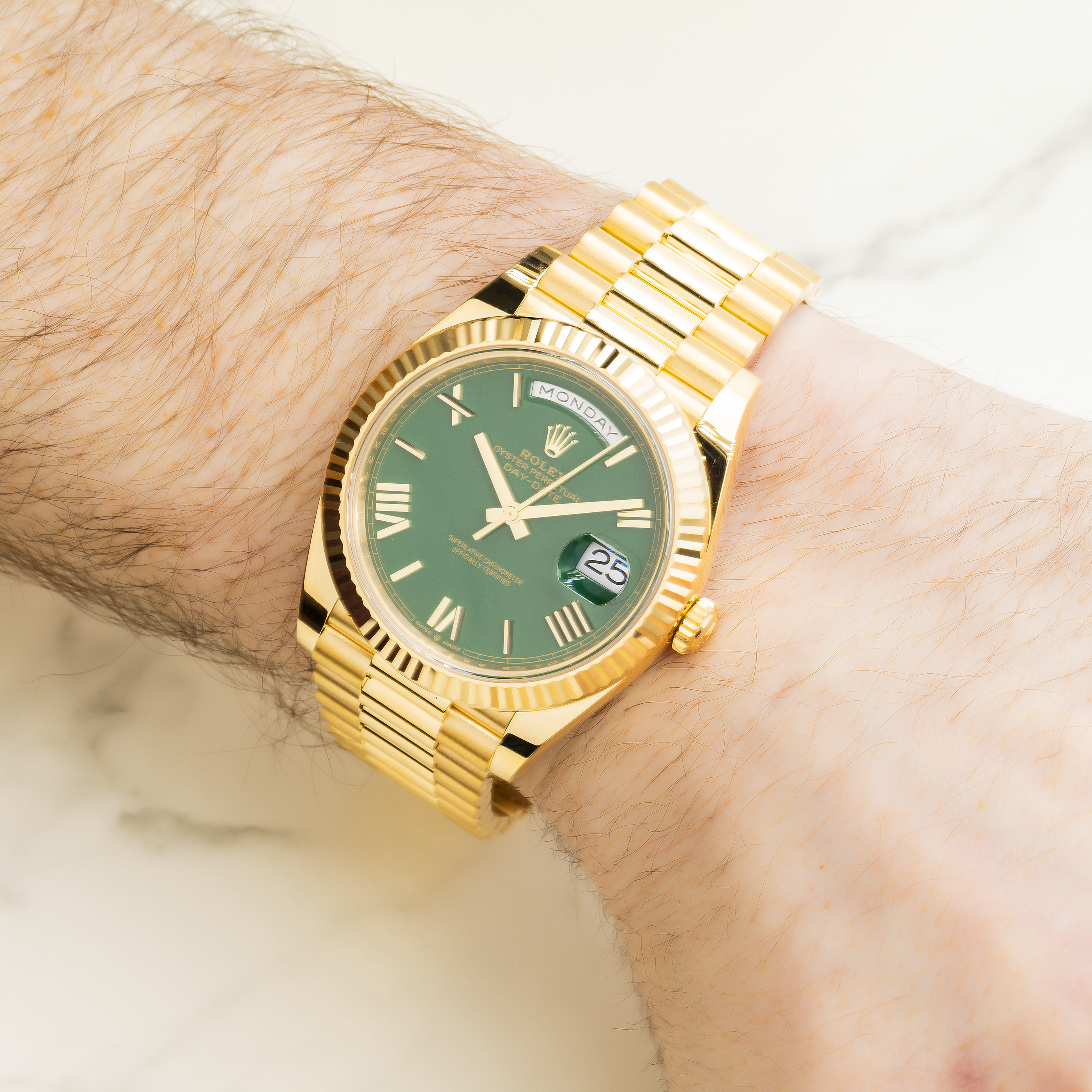 Rolex Day-Date 40MM 228238 Green Roman Dial Fluted Bezel 18K Yellow Gold President Bracelet