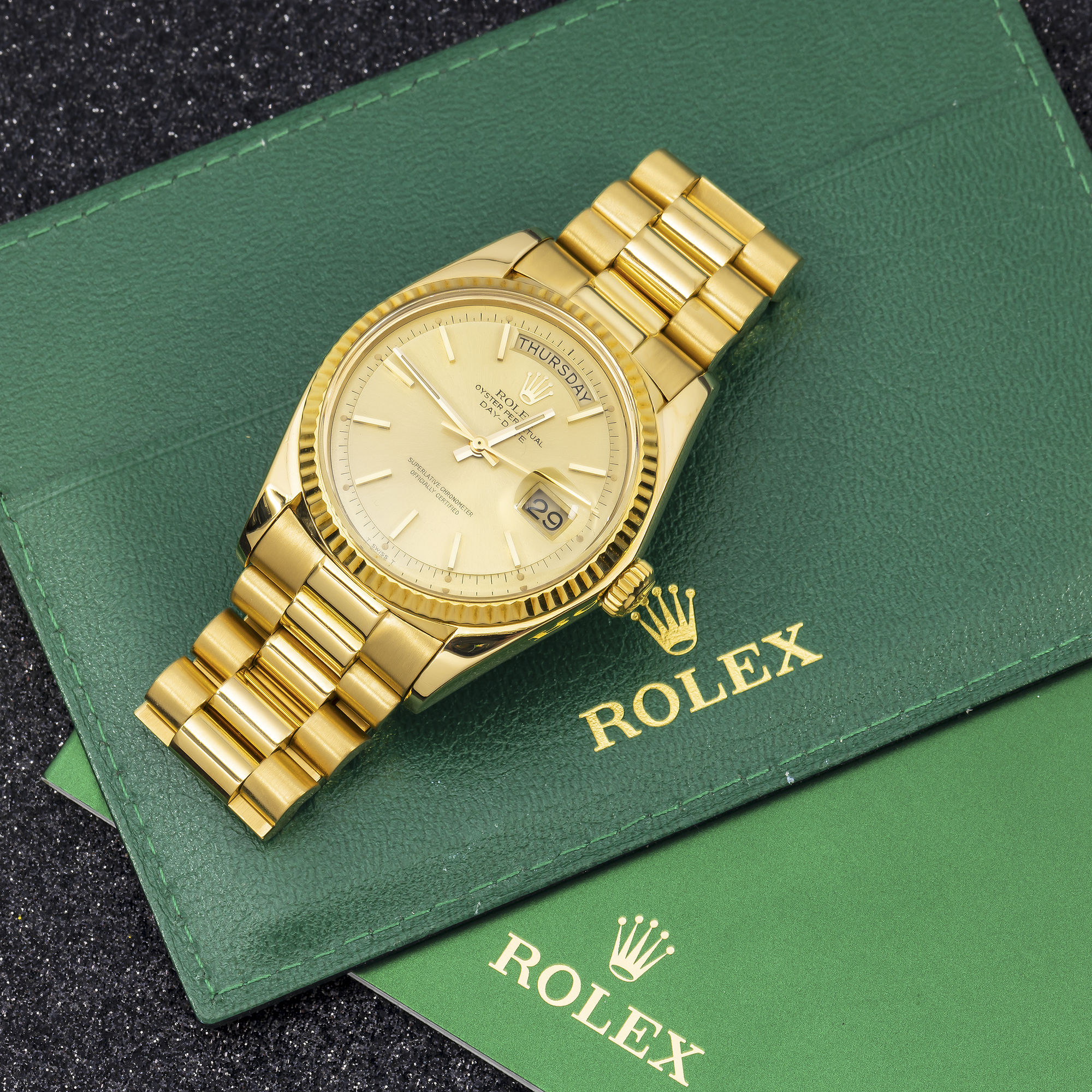 Rolex Day-Date yellow gold with champagne dial and President bracelet close-up