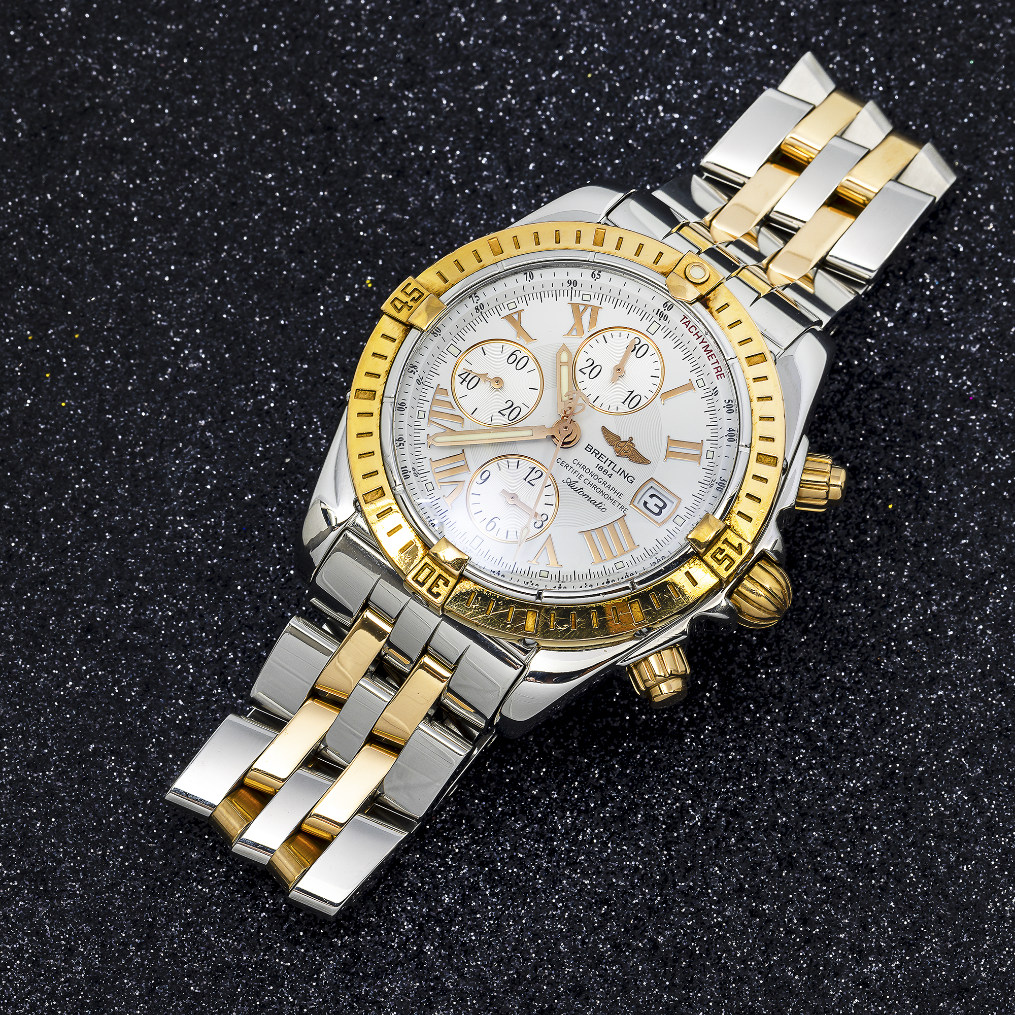 Breitling Chronomat Evolution 43MM C13356 White Roman Dial Yellow Gold Bezel Two Tone Yellow Gold Bracelet