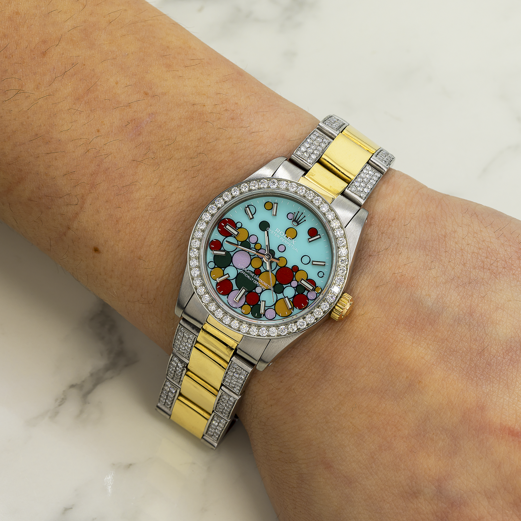 Rolex Oyster Perpetual 31MM 6748 Turquoise Celebration Dial Diamond Bezel Two Tone Yellow Gold Semi Diamond Oyster Bracelet