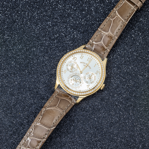 PATEK PHILIPPE GRAND COMPLICATIONS LADIES FIRST PERPETUAL CALENDAR YELLOW GOLD SILVER DIAL DIAMOND BEZEL 7140R-001/132