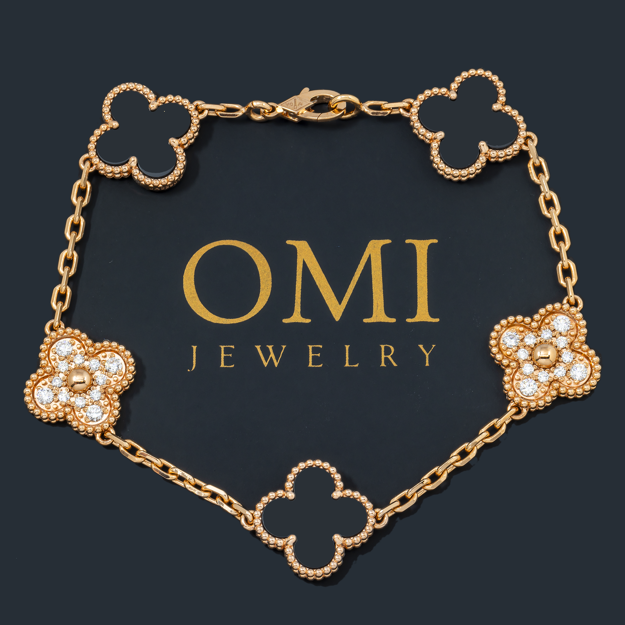 18K GOLD ROUND DIAMOND AND BLACK CLOVER CHAIN BRACELET 0.55 CT