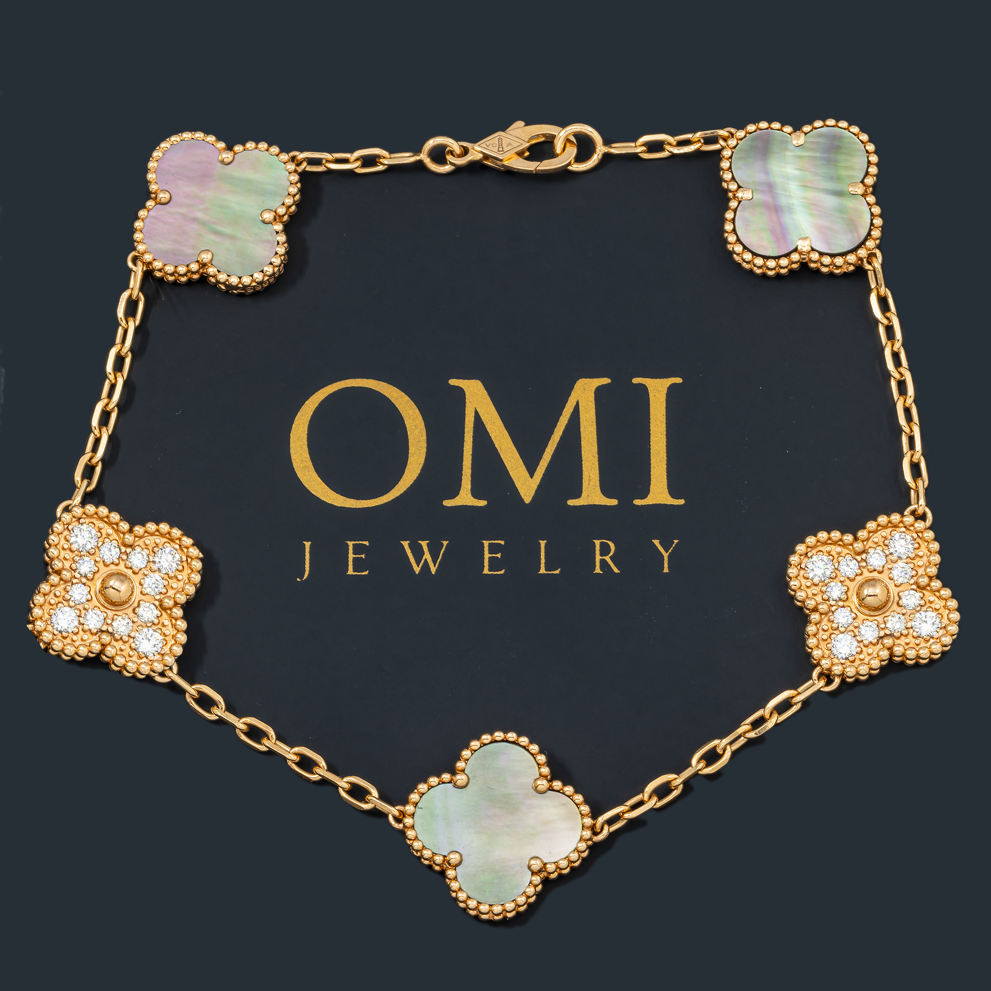 18K GOLD ROUND DIAMOND AND GREY CLOVER CHAIN BRACELET