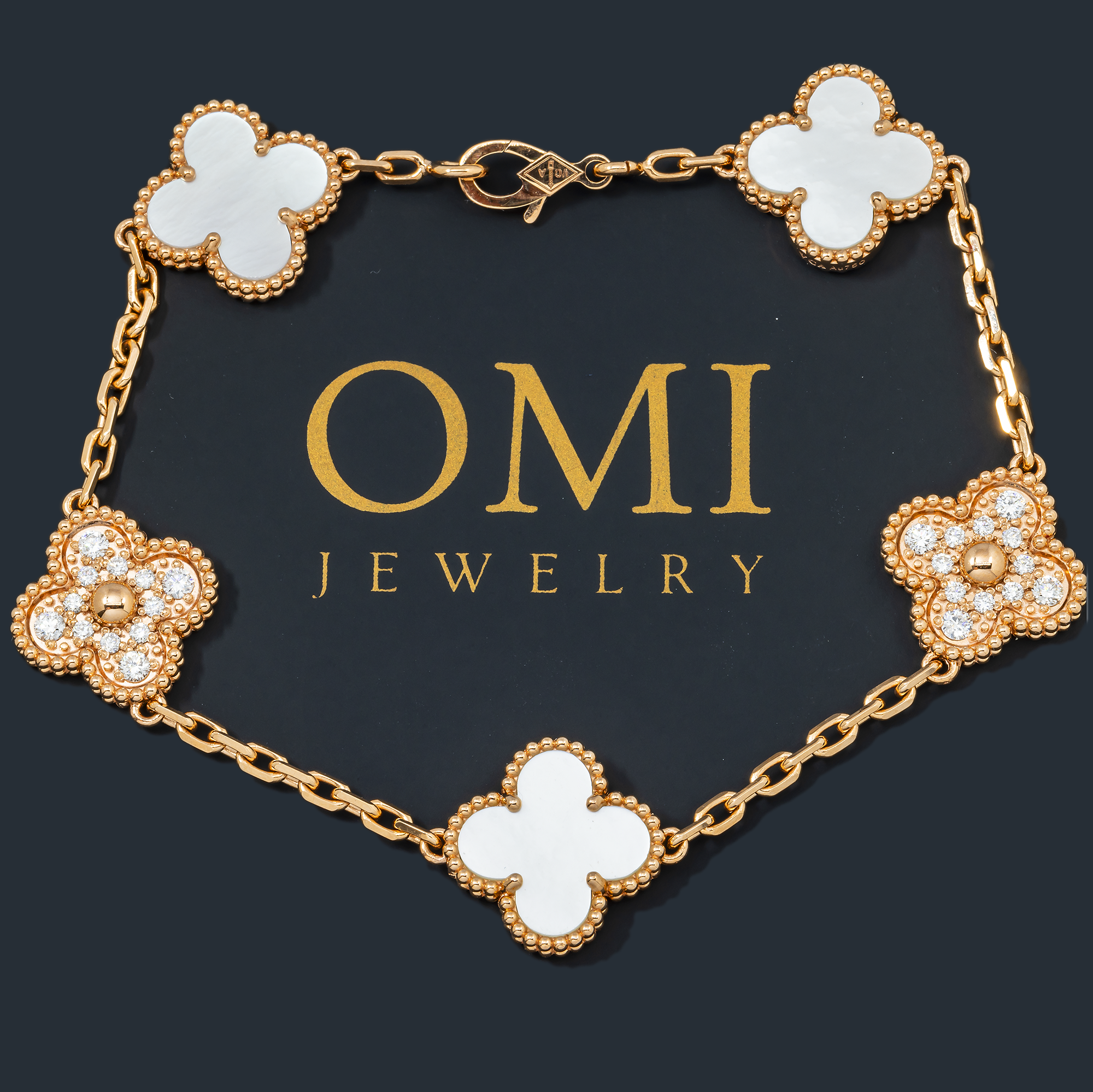 18K GOLD ROUND DIAMOND AND WHITE CLOVER CHAIN BRACELET 0.55 CT