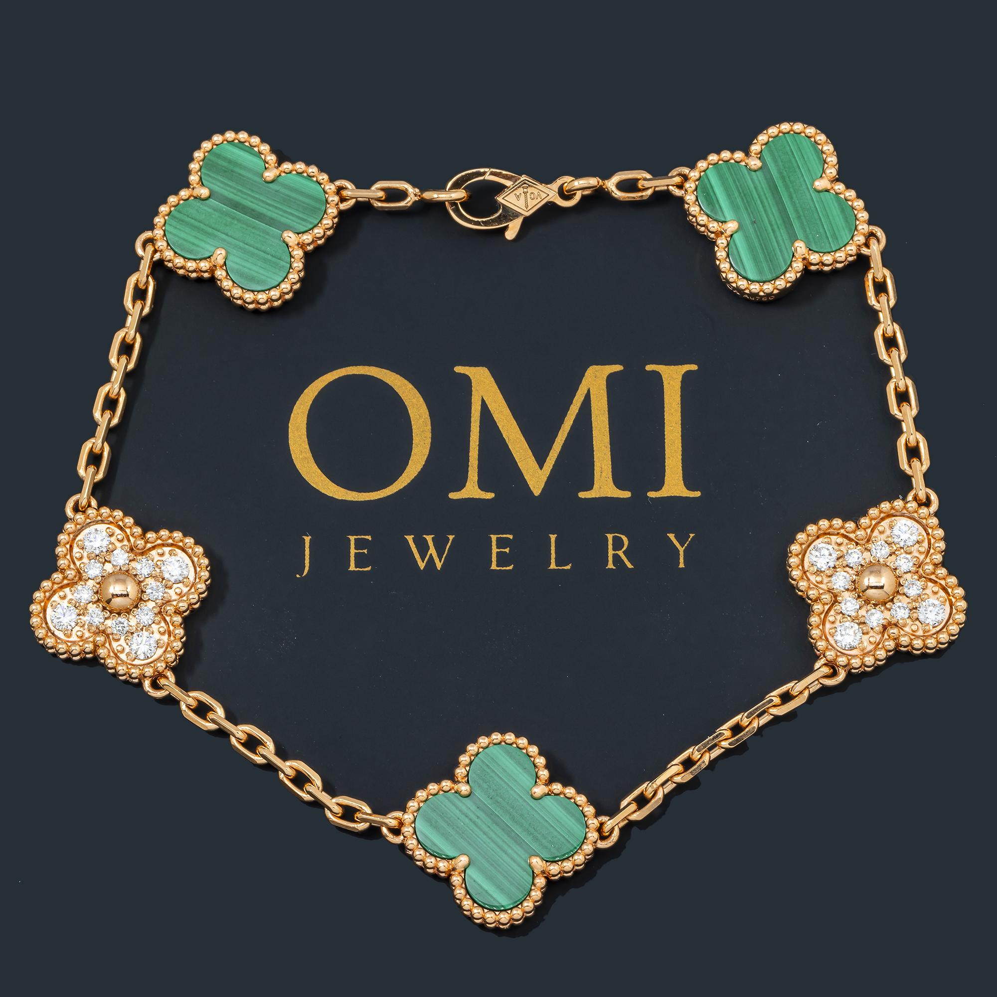 18K GOLD ROUND DIAMOND AND GREEN CLOVER CHAIN BRACELET 0.55 CT