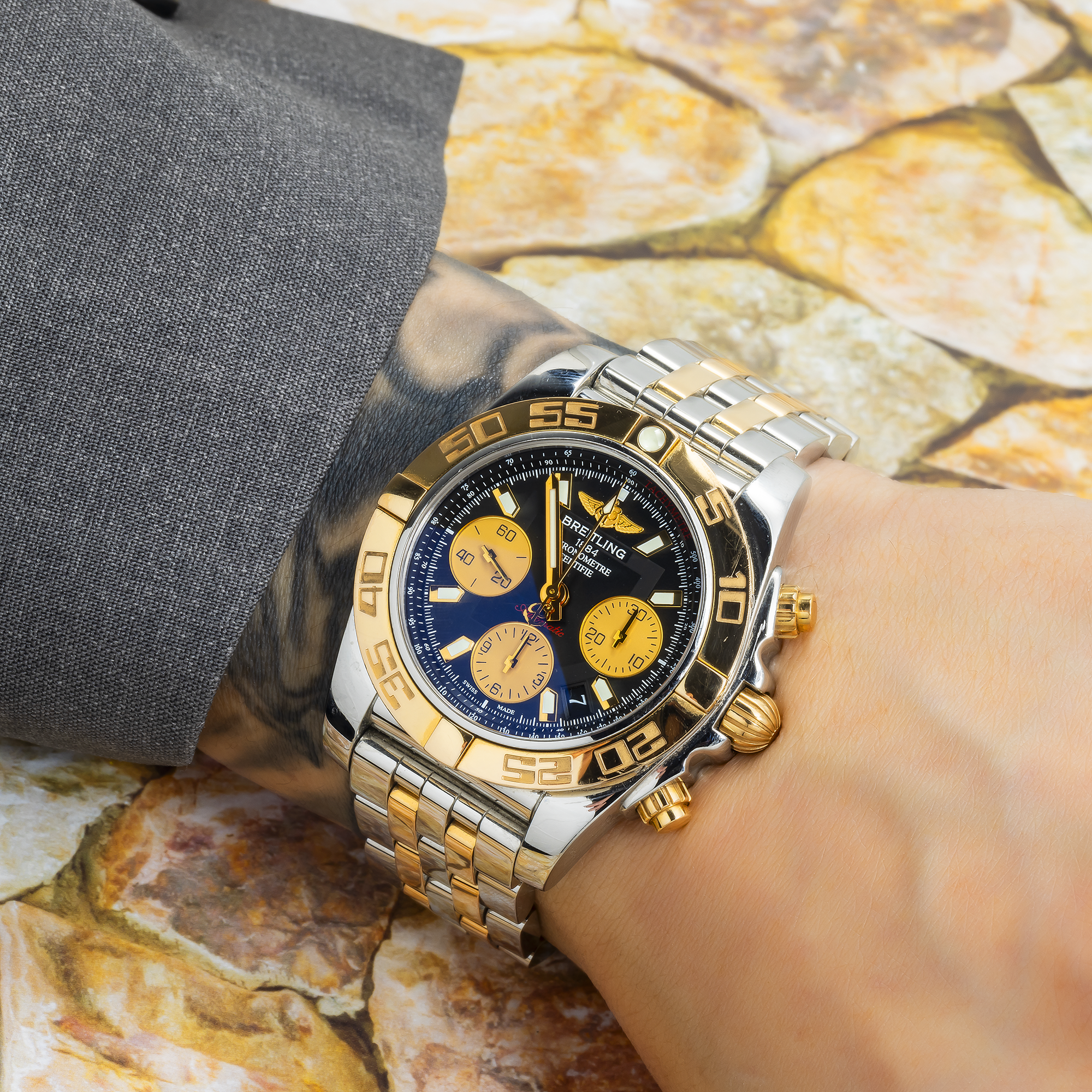 Breitling Chronomat 41MM CB0140 Black Dial Yellow Gold Bezel Two Tone Yellow Gold Bracelet