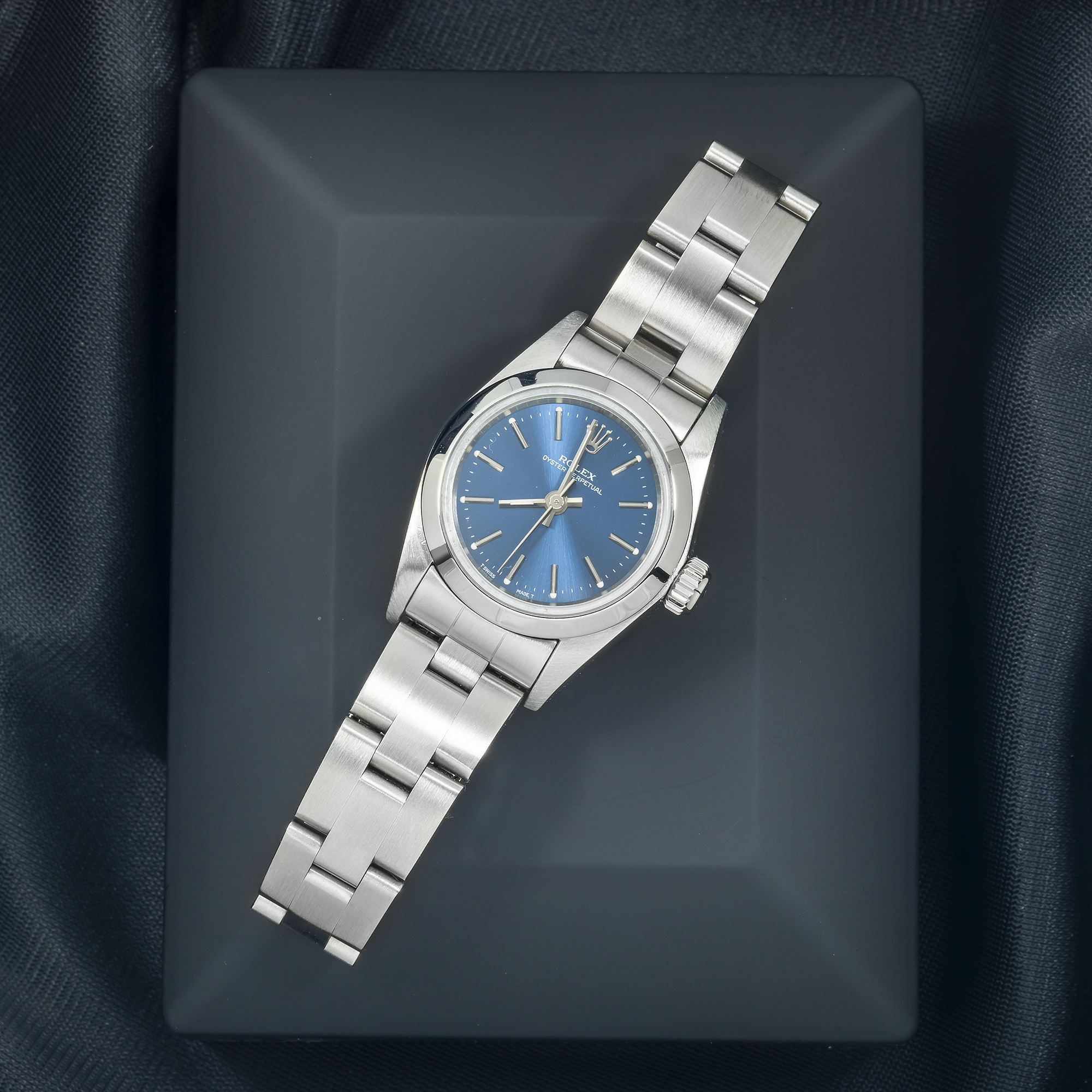 Rolex Oyster Perpetual 26MM 76094 Blue Dial Smooth Bezel Stainless Steel Oyster Bracelet