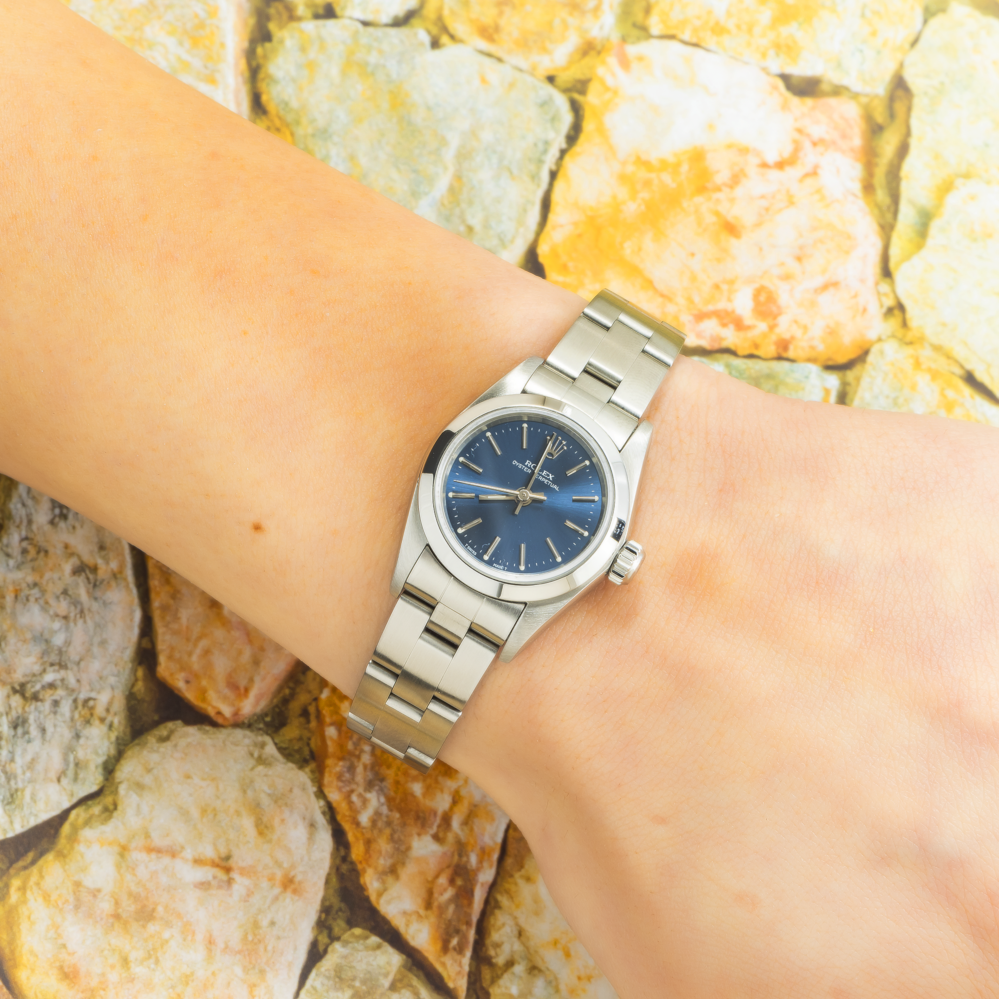 Rolex Oyster Perpetual 26MM 76094 Blue Dial Smooth Bezel Stainless Steel Oyster Bracelet