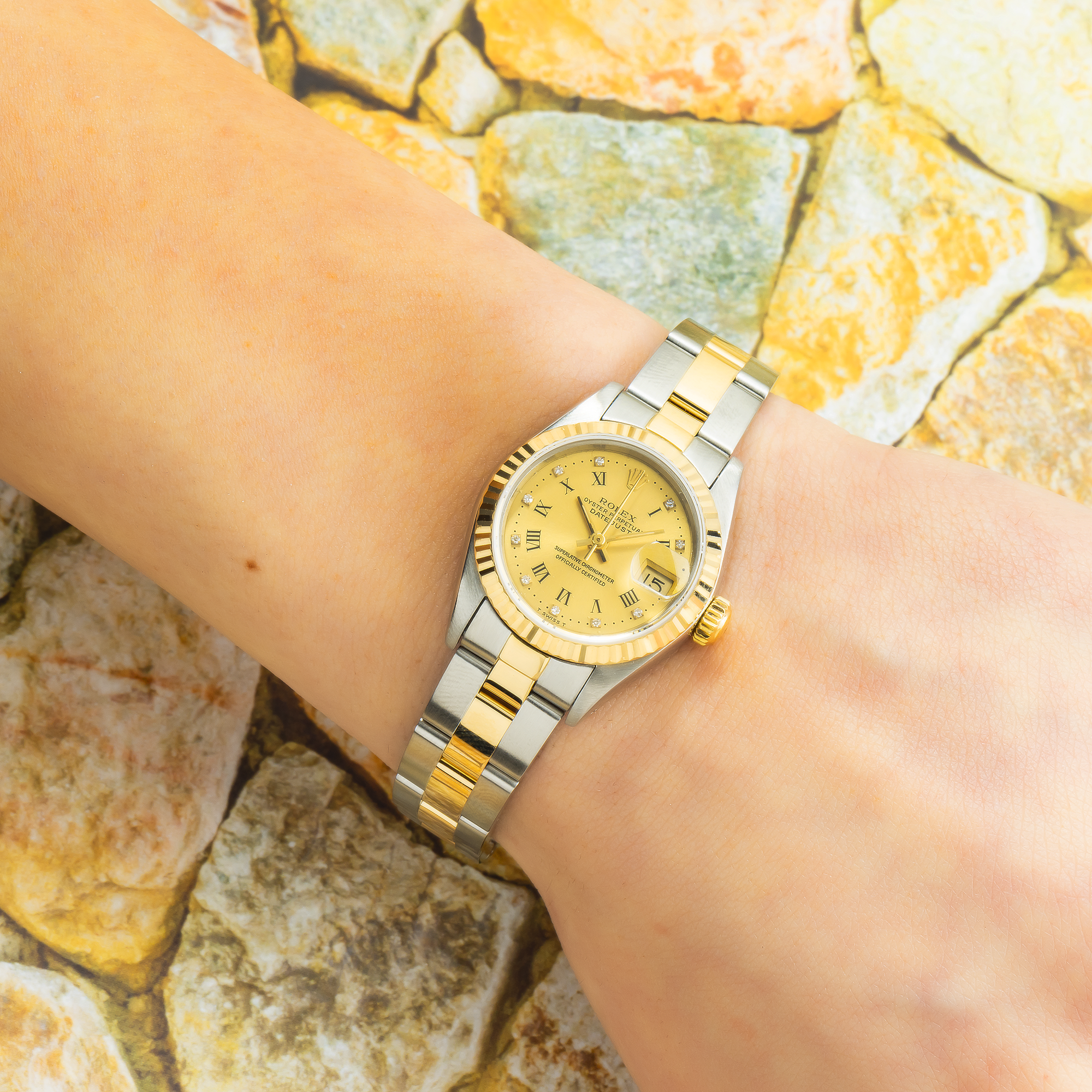 Rolex Datejust 26MM 69173 Champagne Roman Diamond Dial Fluted Bezel Two Tone Yellow Gold Oyster Bracelet