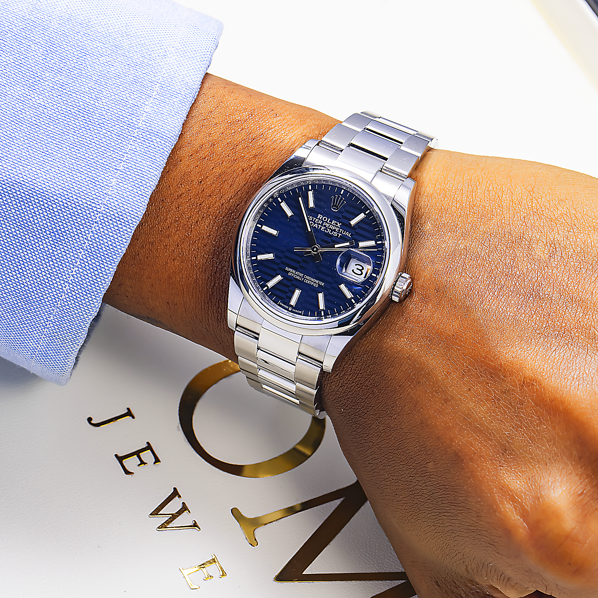 Rolex Datejust 36MM 126200 Blue Motif Dial Smooth Bezel Stainless Steel Oyster Bracelet