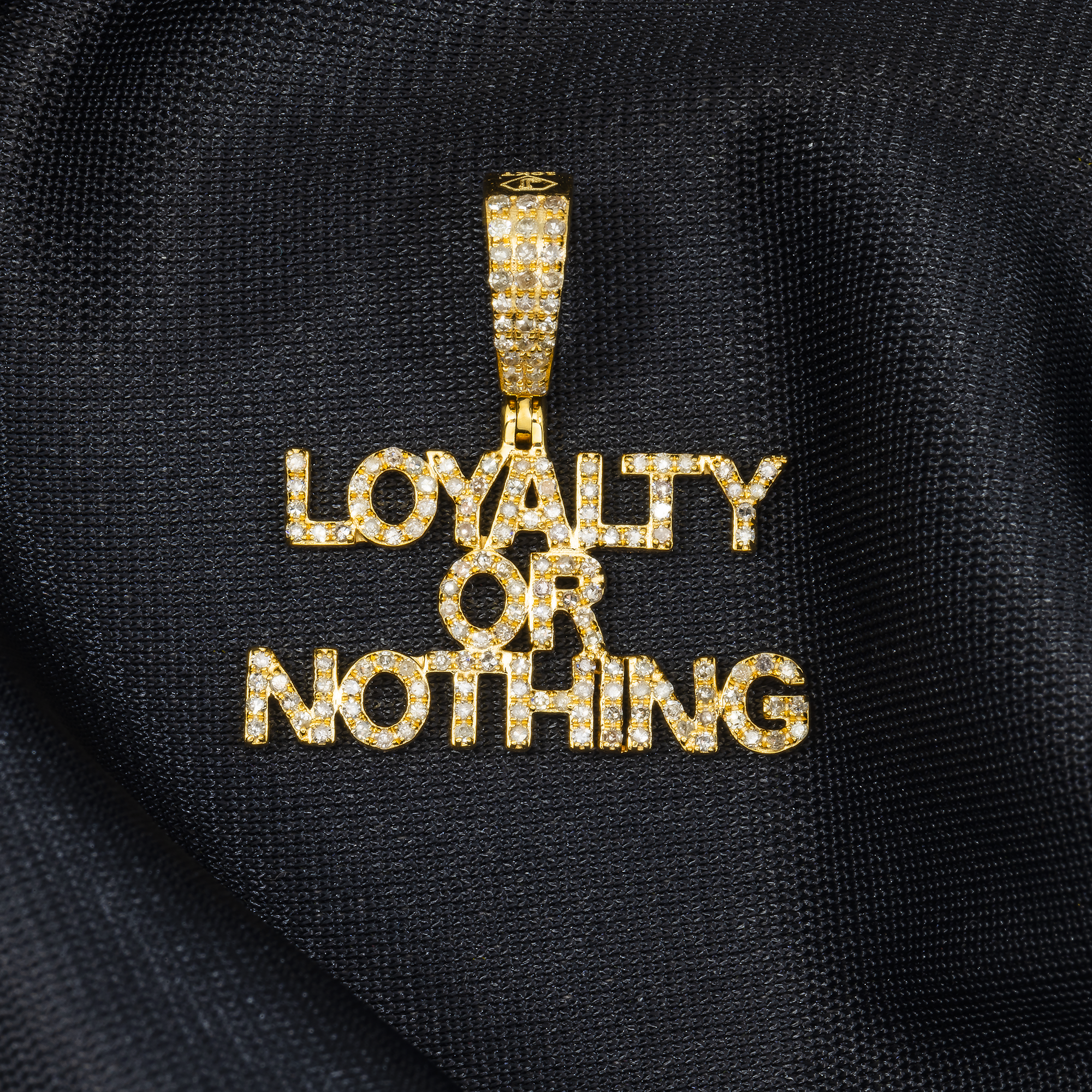 10K GOLD DIAMOND LOYALTY OR NOTHING PENDANT 0.79 CT