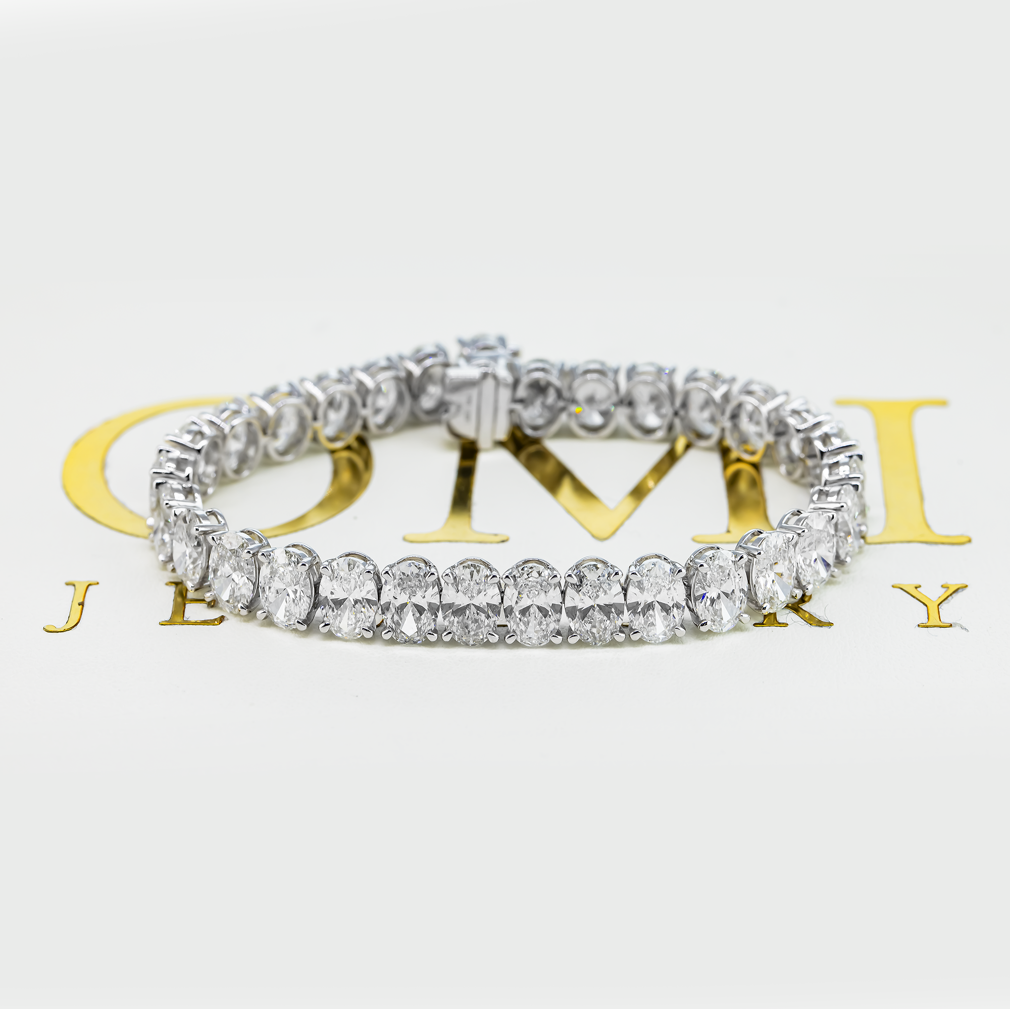 14K GOLD OVAL LAB DIAMOND TENNIS BRACELET 31.84 CT