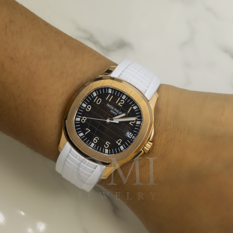 PATEK PHILIPPE AQUANAUT 5167R 40MM BROWN DIAL WITH WHITE COMPOSITE STRAP.