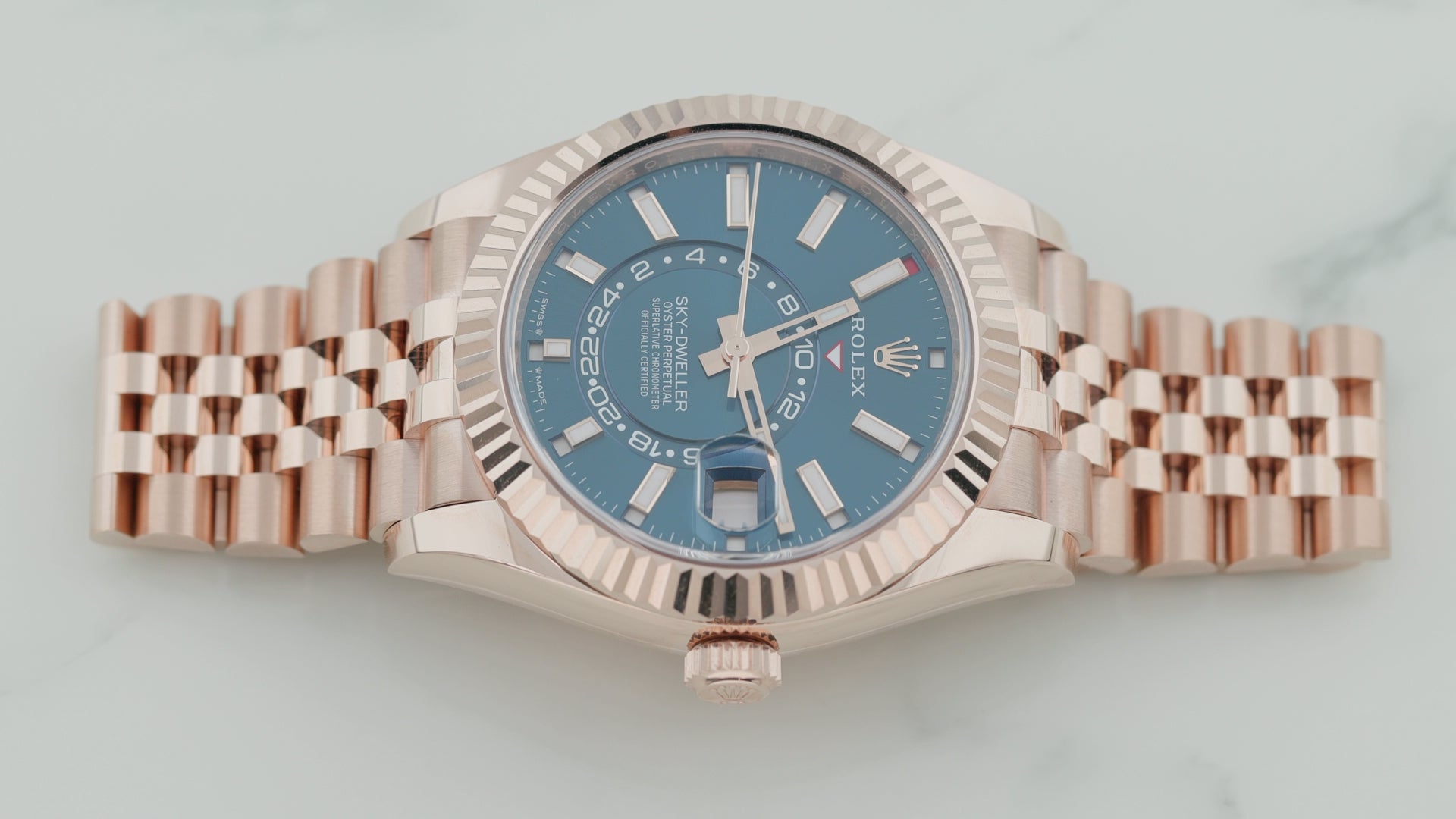 Rolex Sky-Dweller 42MM 336935 Blue Dial Fluted Bezel 18K Rose Gold Jubilee Bracelet