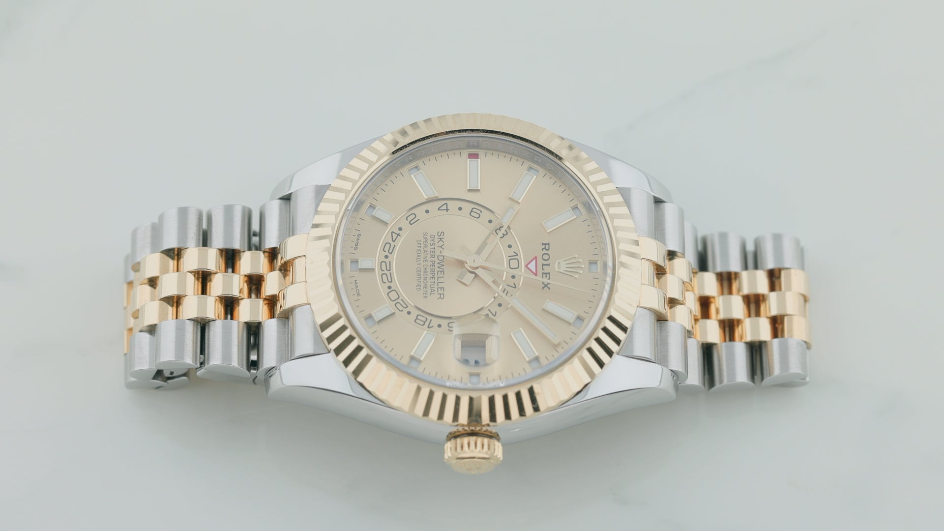 Rolex Sky-Dweller 42MM 336933 Champagne Dial Fluted Bezel Two Tone Yellow Gold Jubilee Bracelet