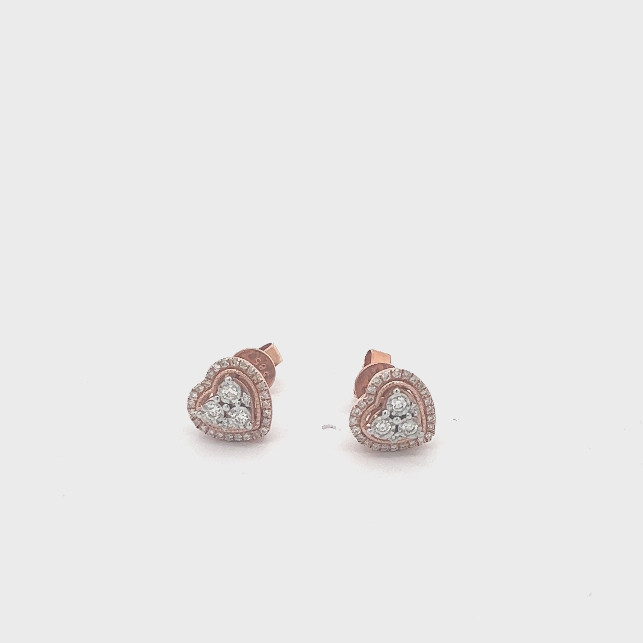 CL2355R $3,990.00 14KR 0.33CTW ILLUSION SET DIAMOND HEART CLUSTER EARRINGS - HEART HALO__2024-04-18-15-49-32.mp4
