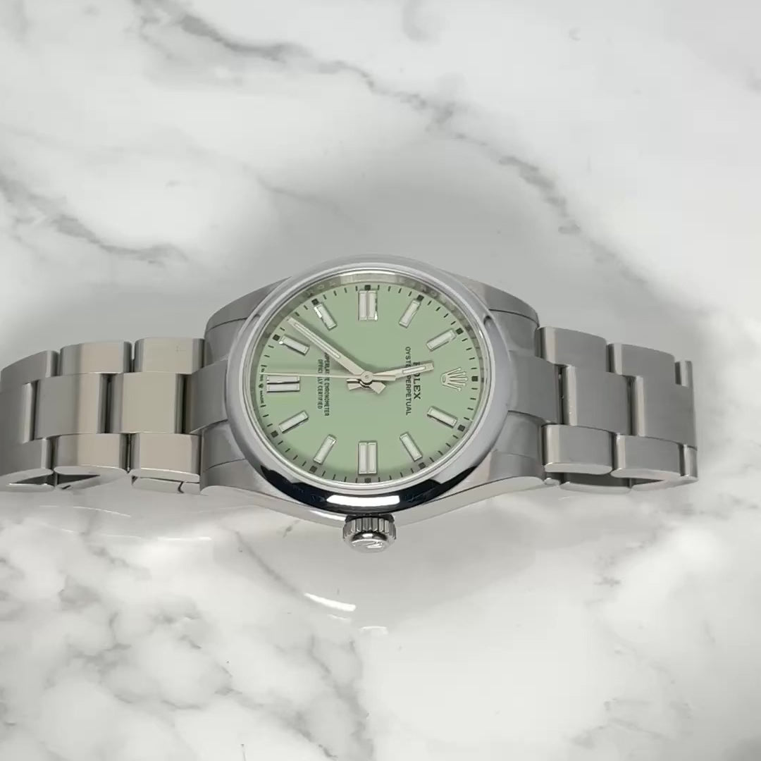 ROLEX OYSTER PERPETUAL 31MM  PISTACHIO  DIAL STAINLESS STEEL WATCH 277200