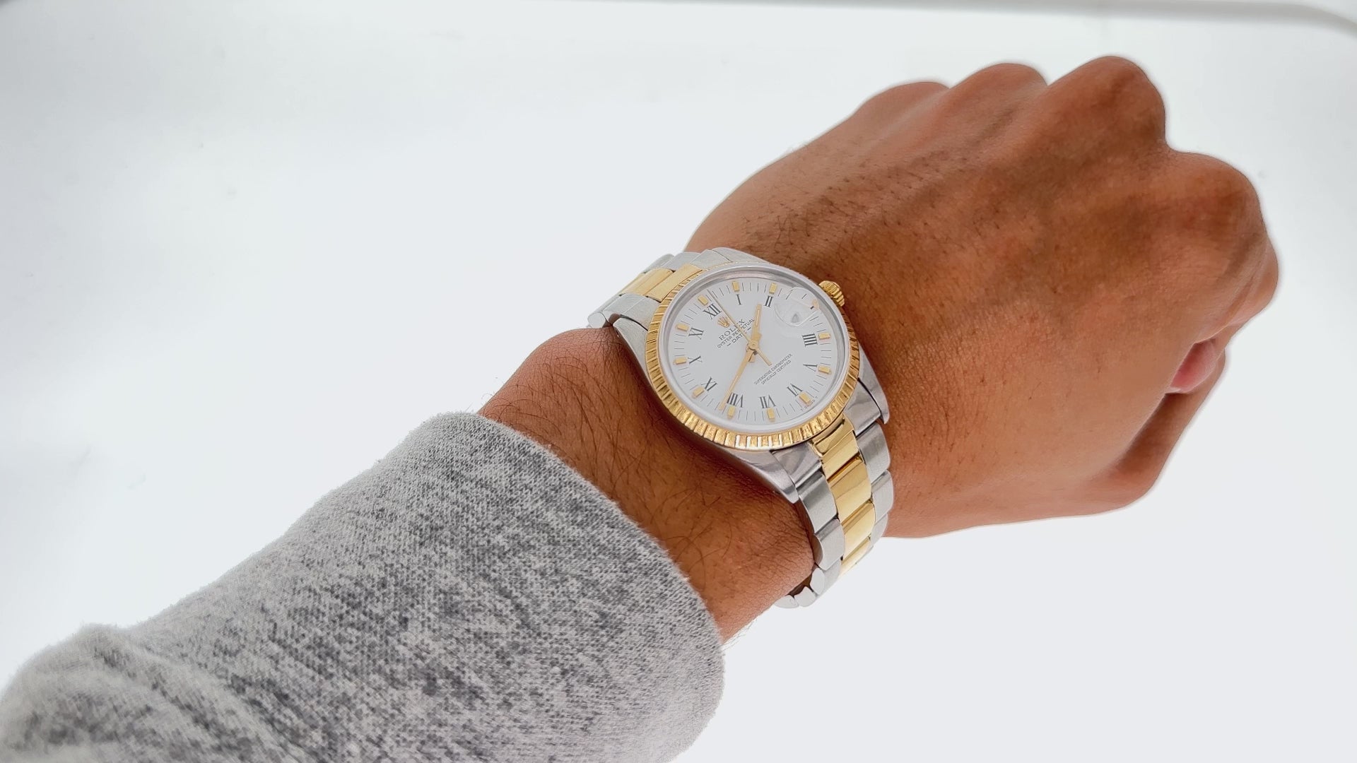 Rolex Date 34MM 15203 White Roman Dial Engine Turned Bezel Two Tone Yellow Gold Oyster Bracelet