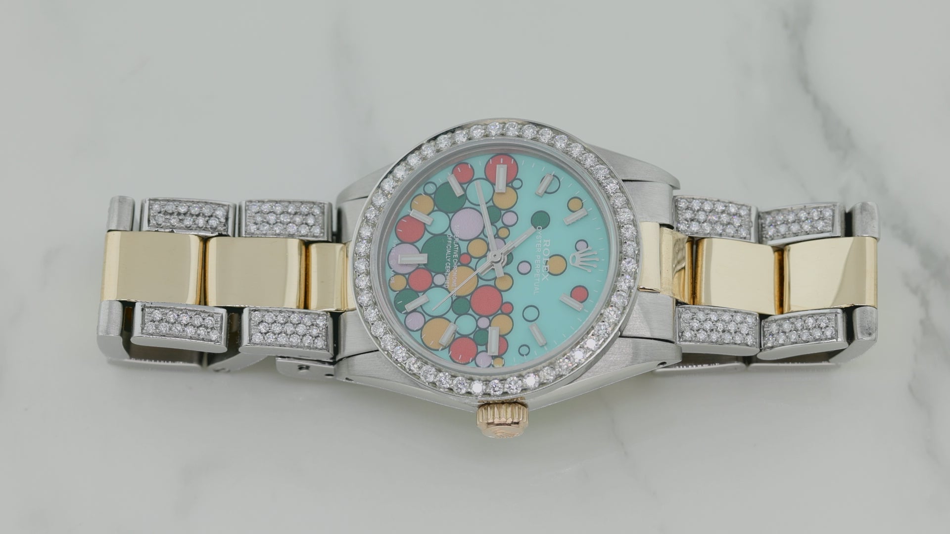 Rolex Oyster Perpetual 31MM 6748 Turquoise Celebration Dial Diamond Bezel Two Tone Yellow Gold Semi Diamond Oyster Bracelet