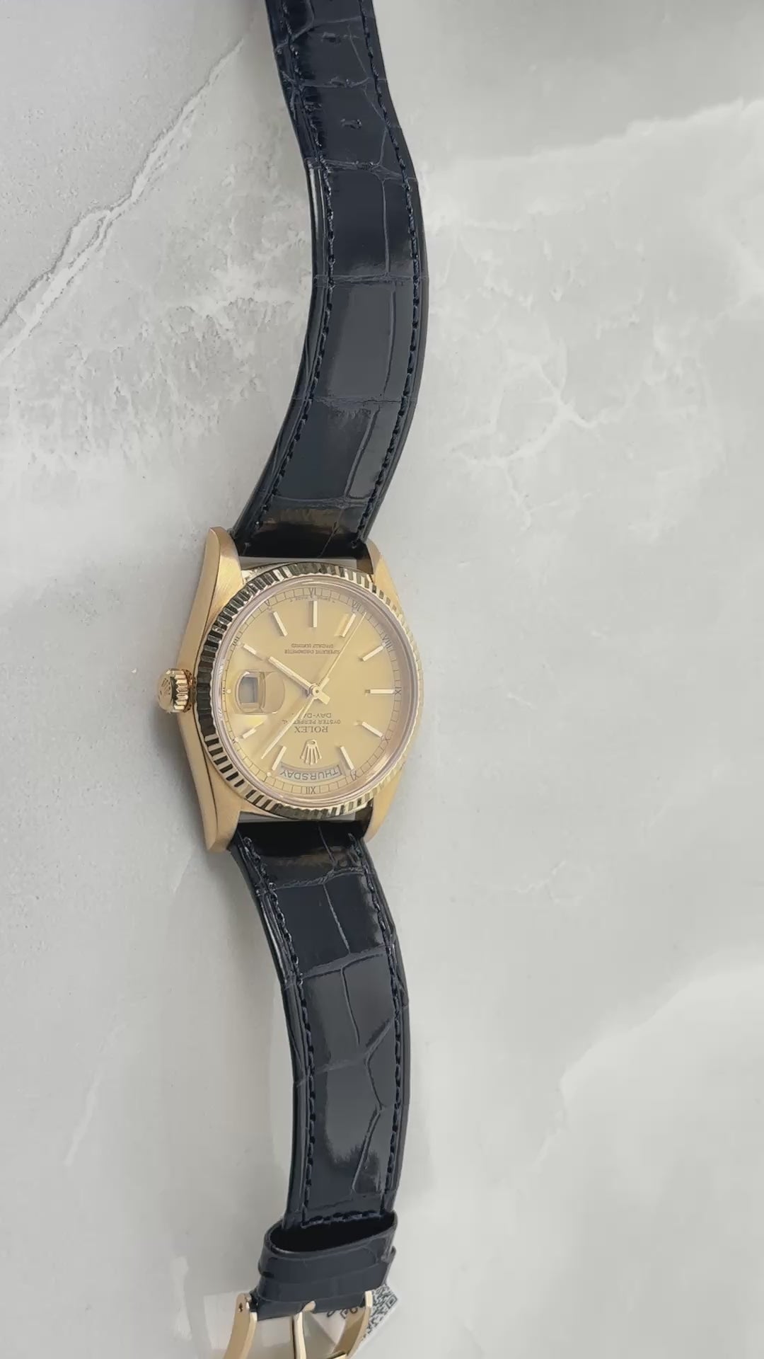ROLEX DAY-DATE 36 18K YELLOW GOLD CHAMPAGNE DIAL BLACK LEATHER STRAP REF. 18238