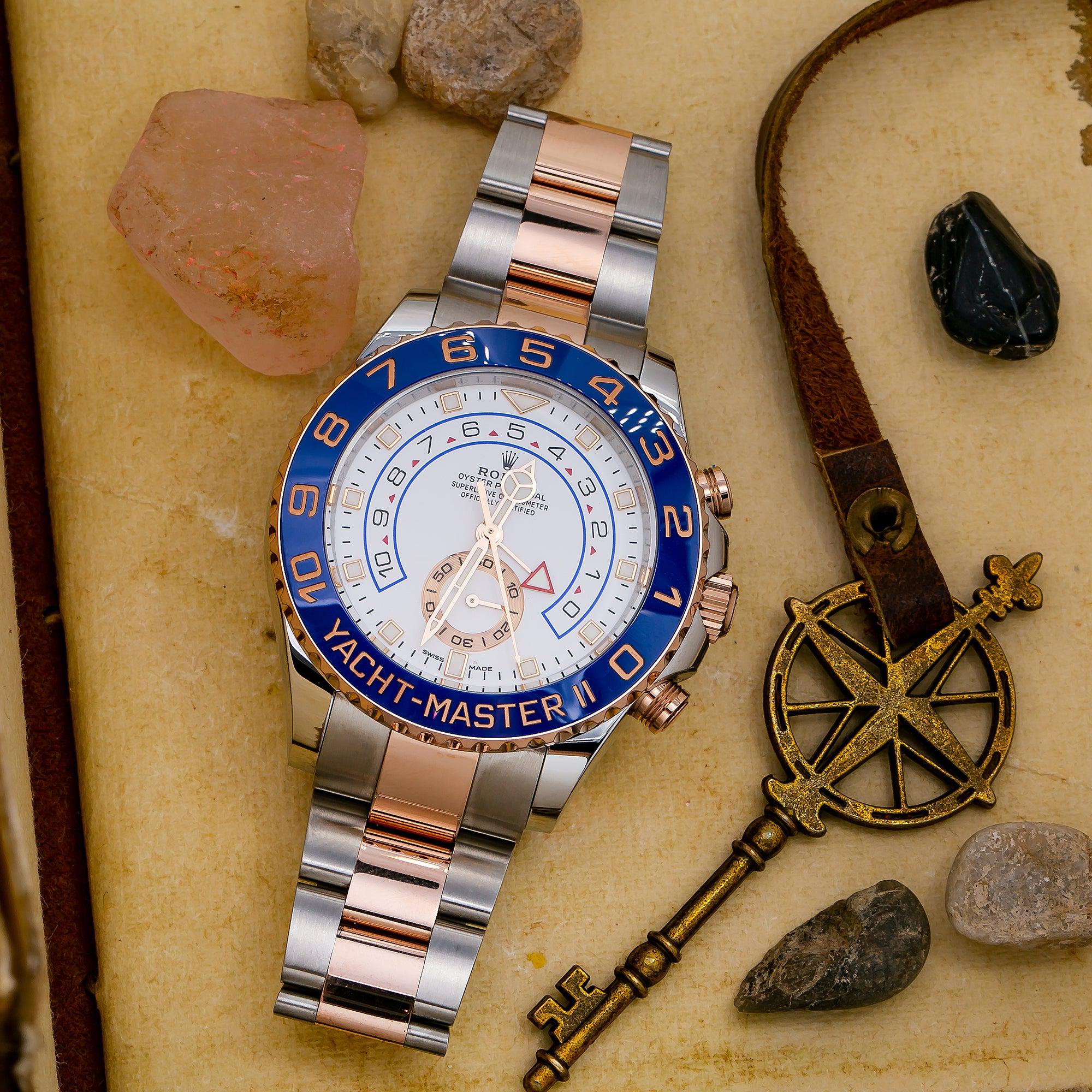 Rolex Yacht-Master II 44MM 116681 White Dial Blue Bezel Two Tone 18K Rose Gold Oyster Bracelet