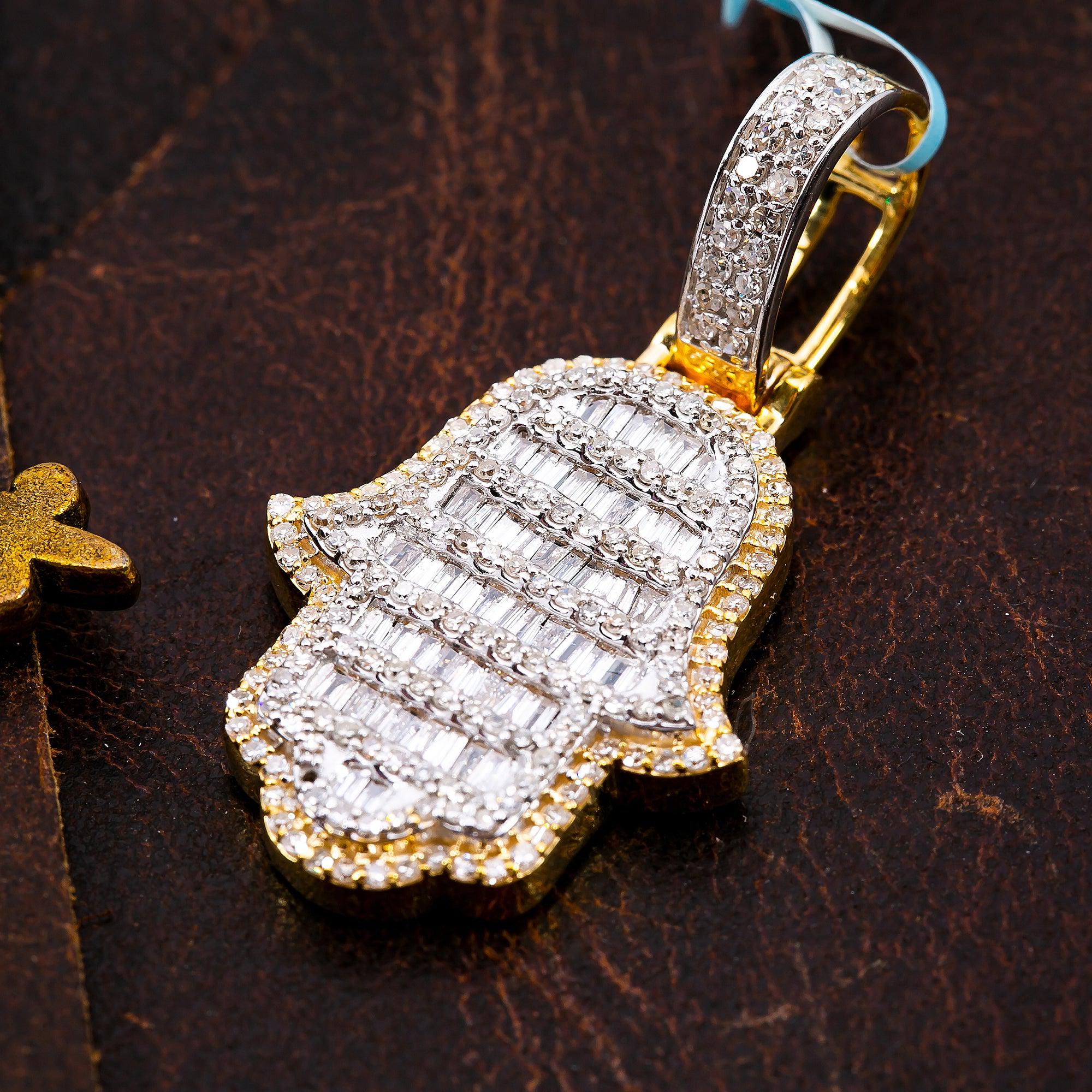 10K YELLOW GOLD HAMSA WITH 1.4 CT BAGUETTE AND ROUND DIAMONDS