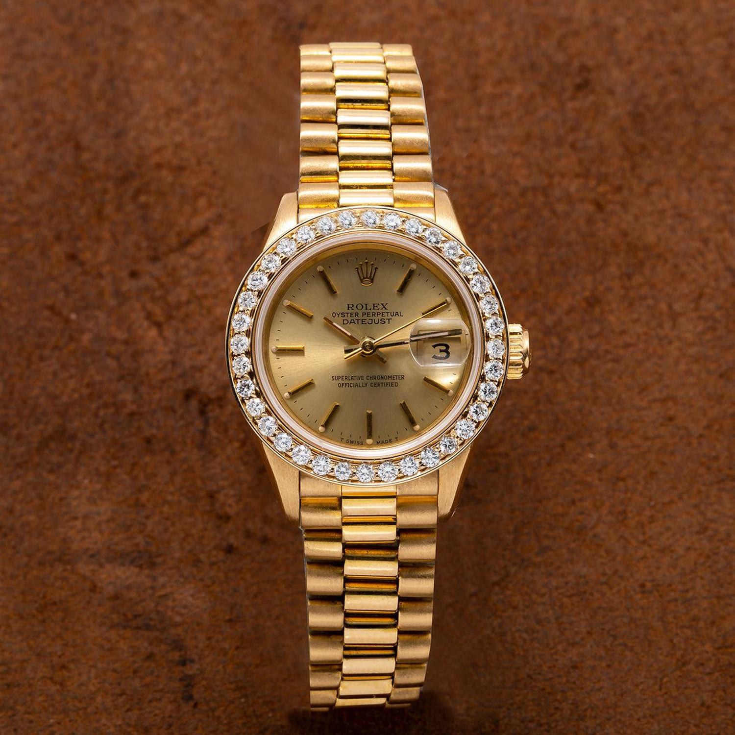 Rolex Datejust 26MM 69178 Champagne Dial Diamond Bezel 18K Yellow Gold President Bracelet 0.8ct