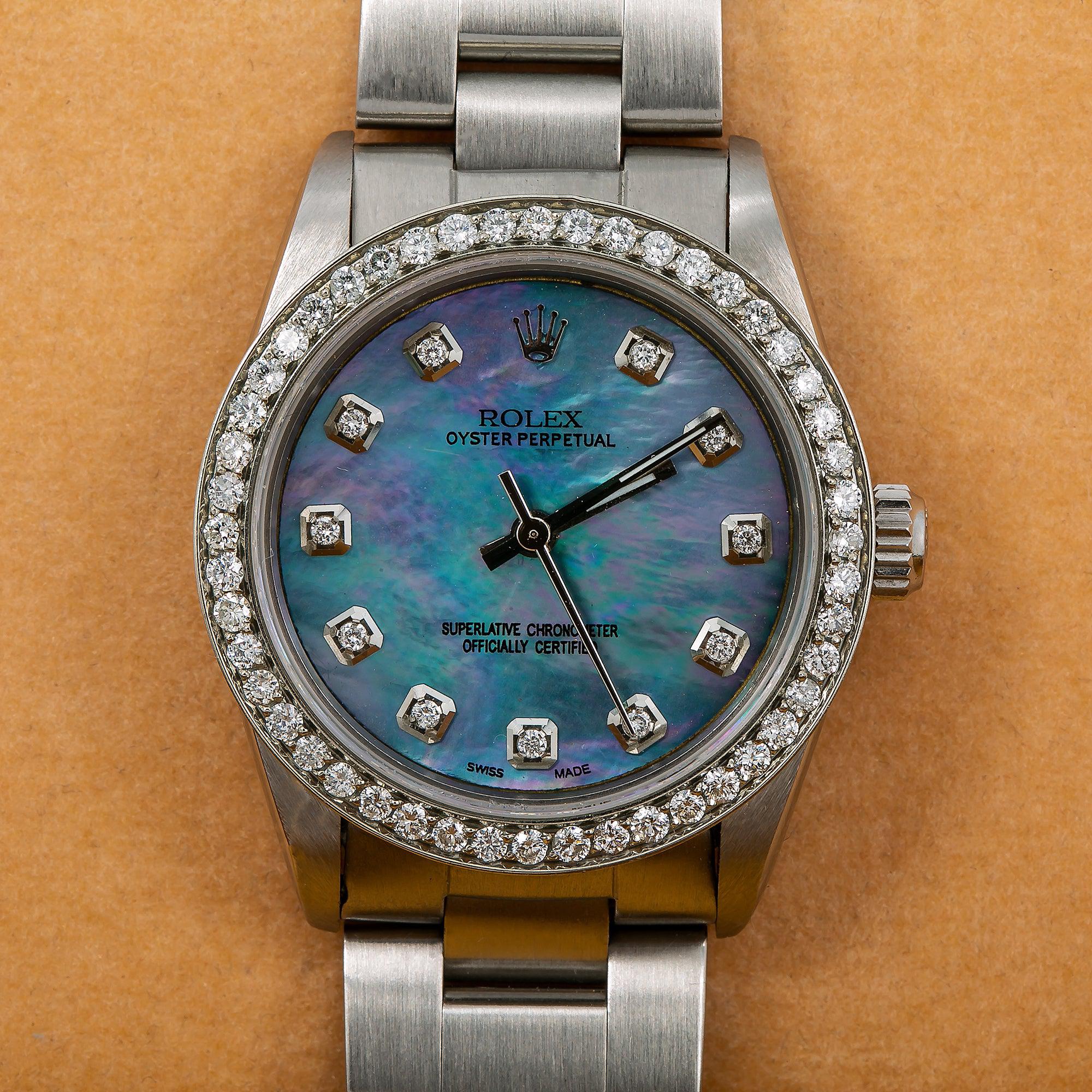 Rolex Oyster Perpetual 31MM 67480 Blue Mother of Pearl Diamond Dial Diamond Bezel Stainless Steel Oyster Bracelet 1.05ct