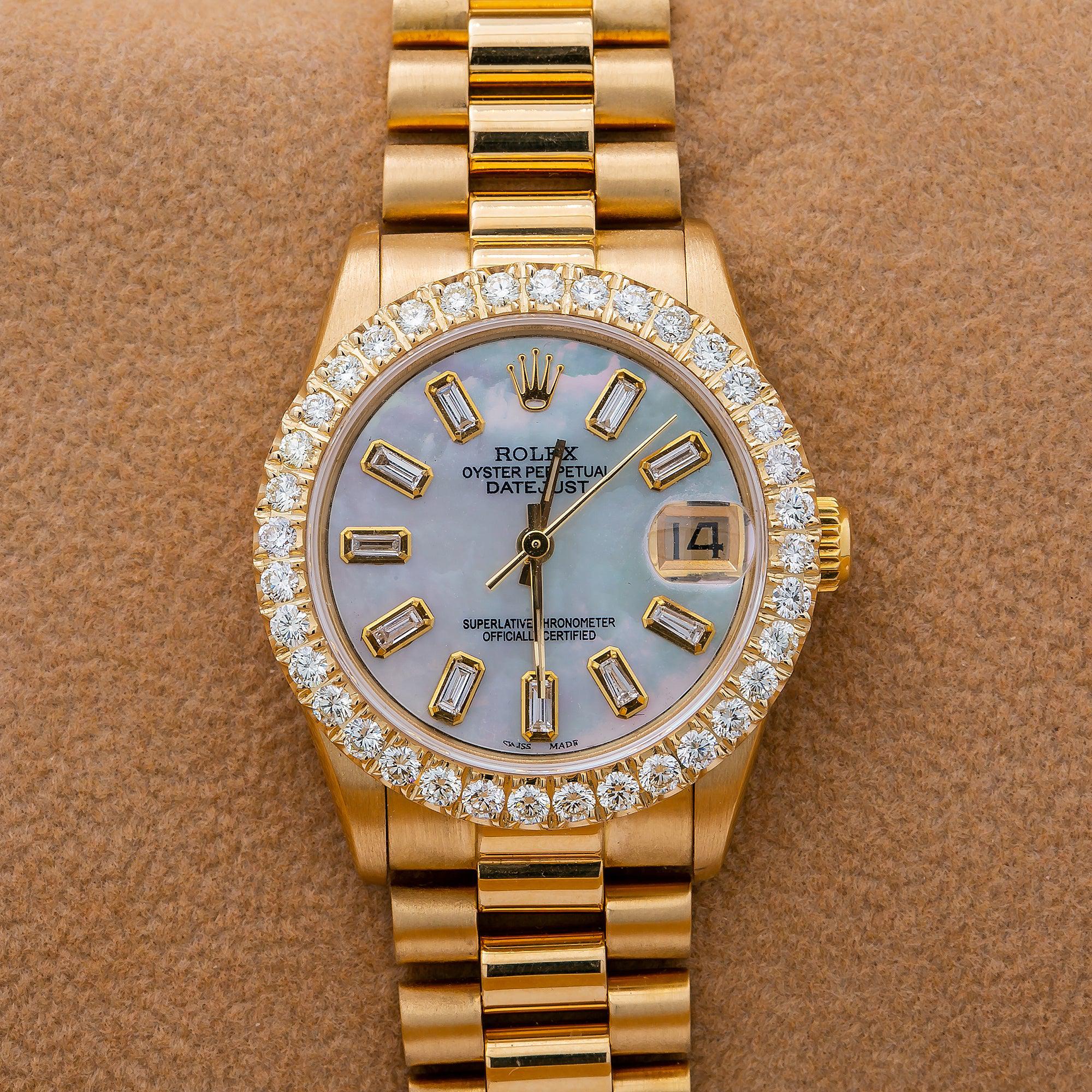 Rolex Datejust 31MM 68278 Blue Mother of Pearl Baguette Diamond Dial Diamond Bezel 18K Yellow Gold President Bracelet