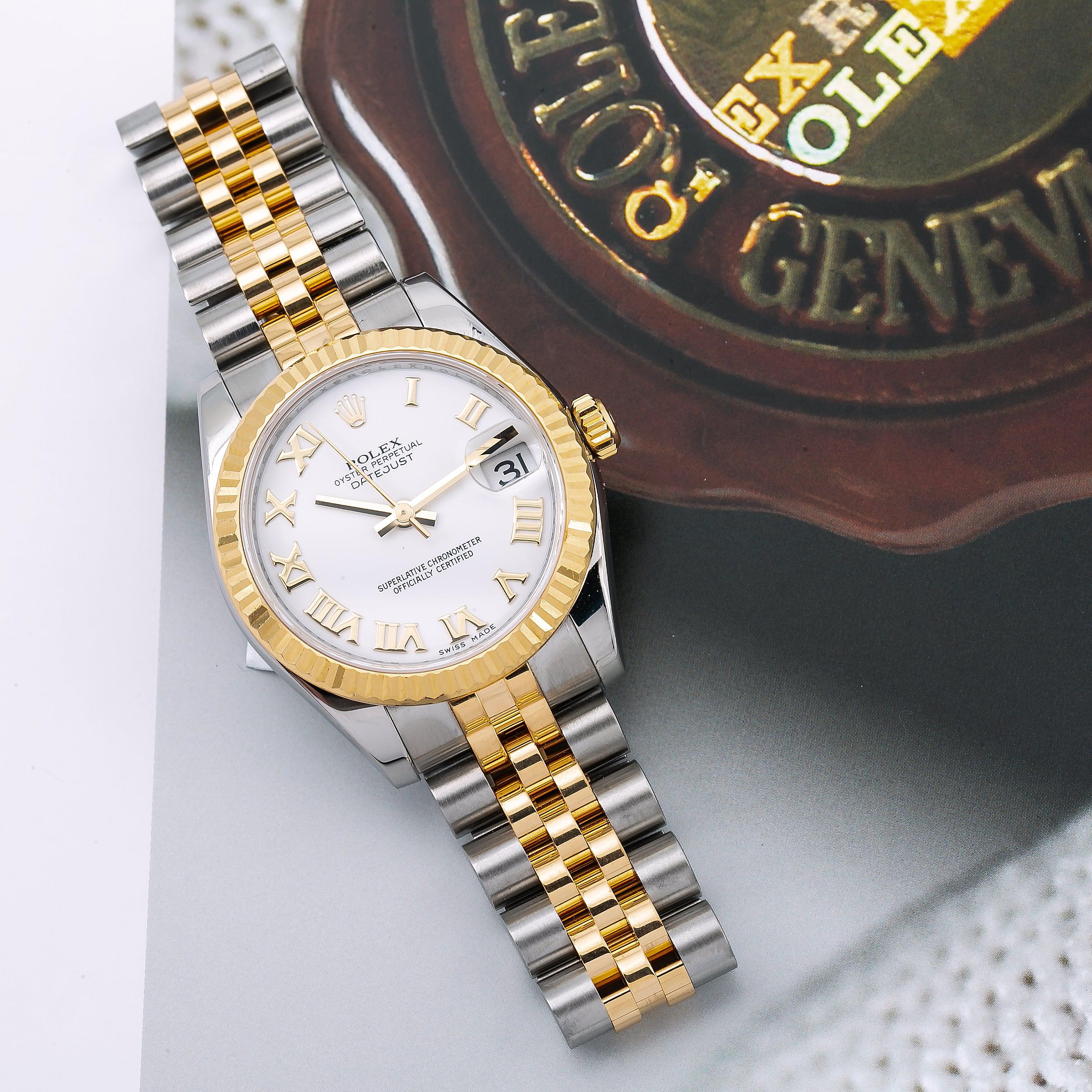Rolex Datejust 31MM 178273 White Roman Dial Fluted Bezel Two Tone Yellow Gold Jubilee Bracelet