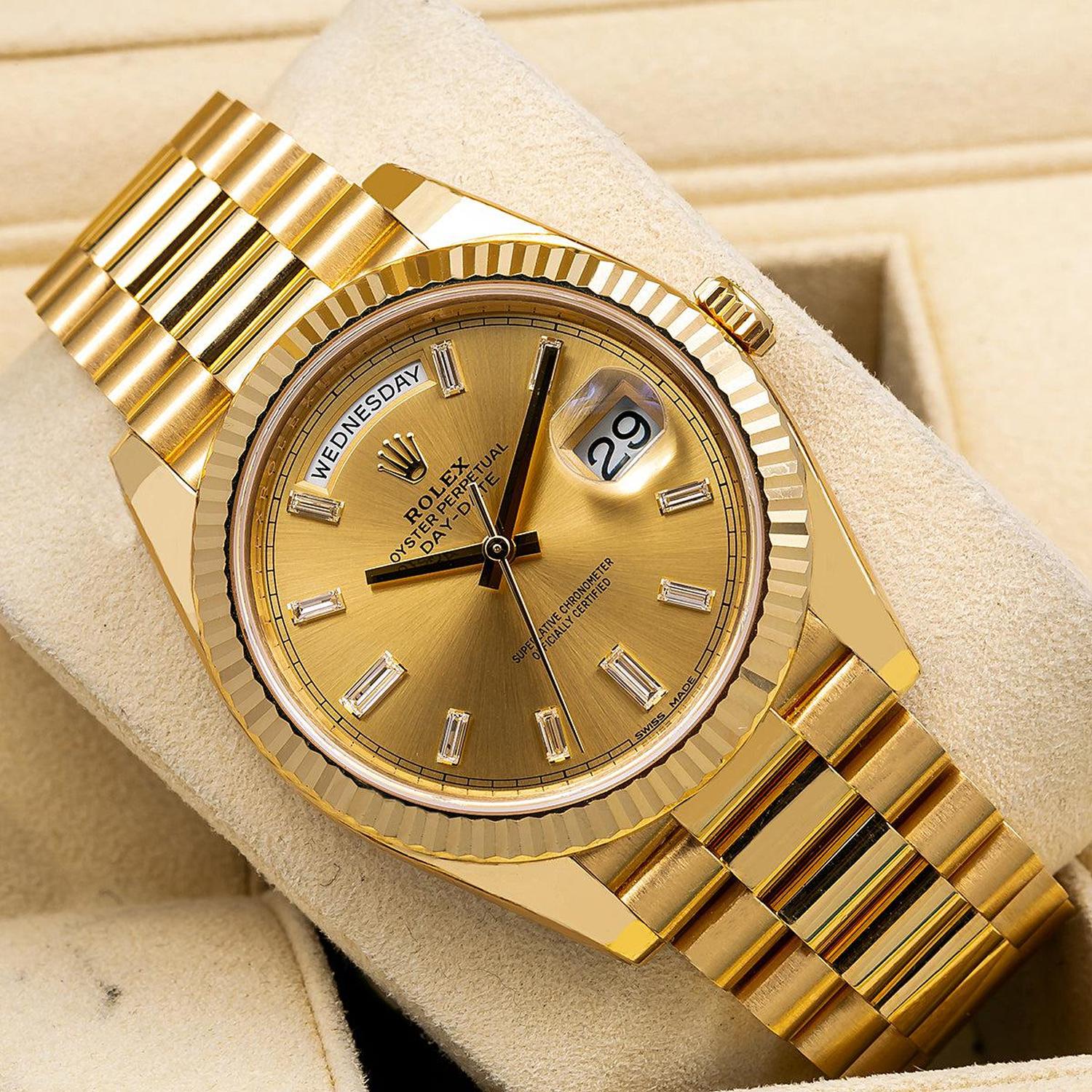 Rolex Day-Date 40MM 228238 Champagne Baguette Diamond Dial Fluted Bezel 18K Yellow Gold President Bracelet