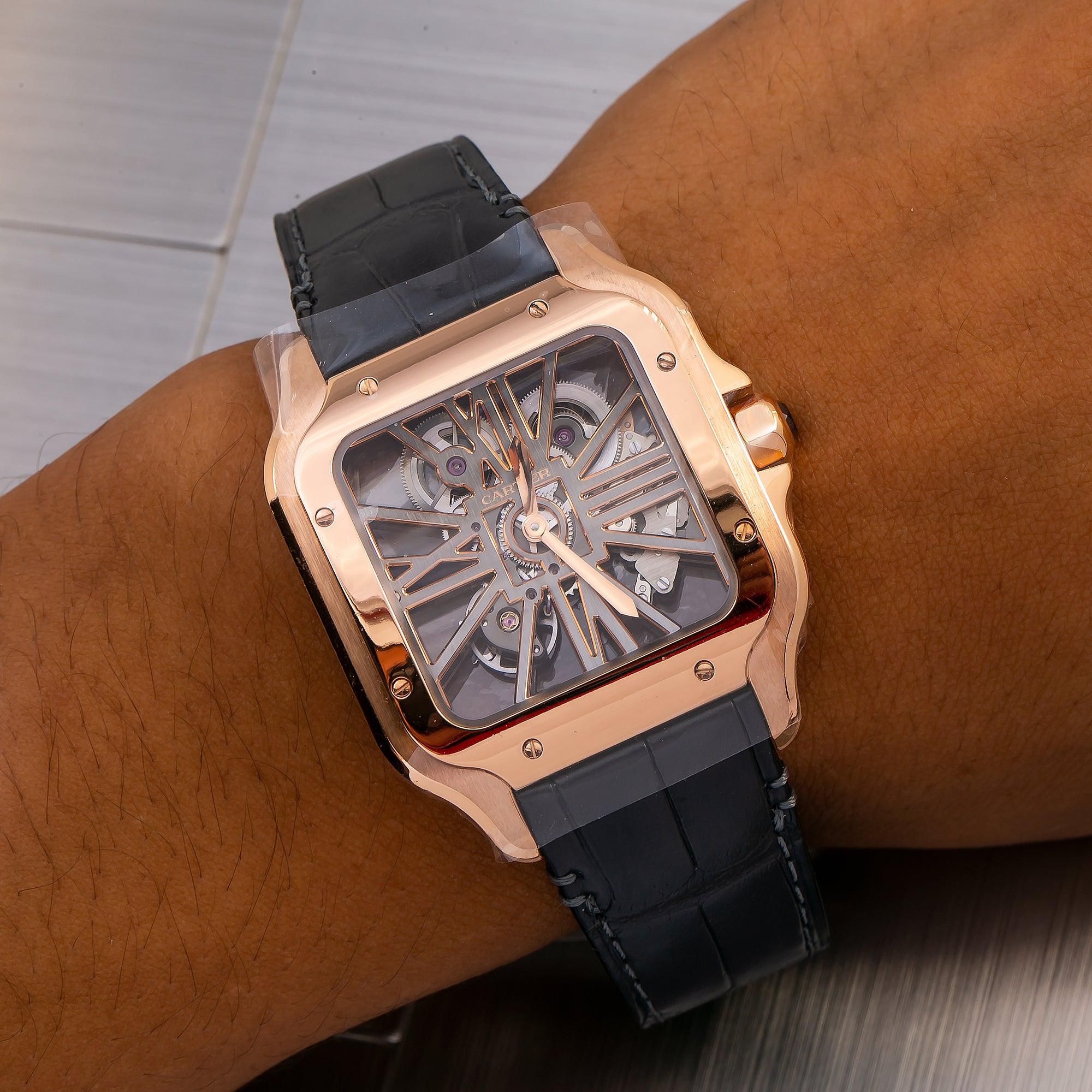 Cartier Santos 39.8MM WHSA0010 Skeleton Roman Dial Rose Gold Bezel Black Leather Strap