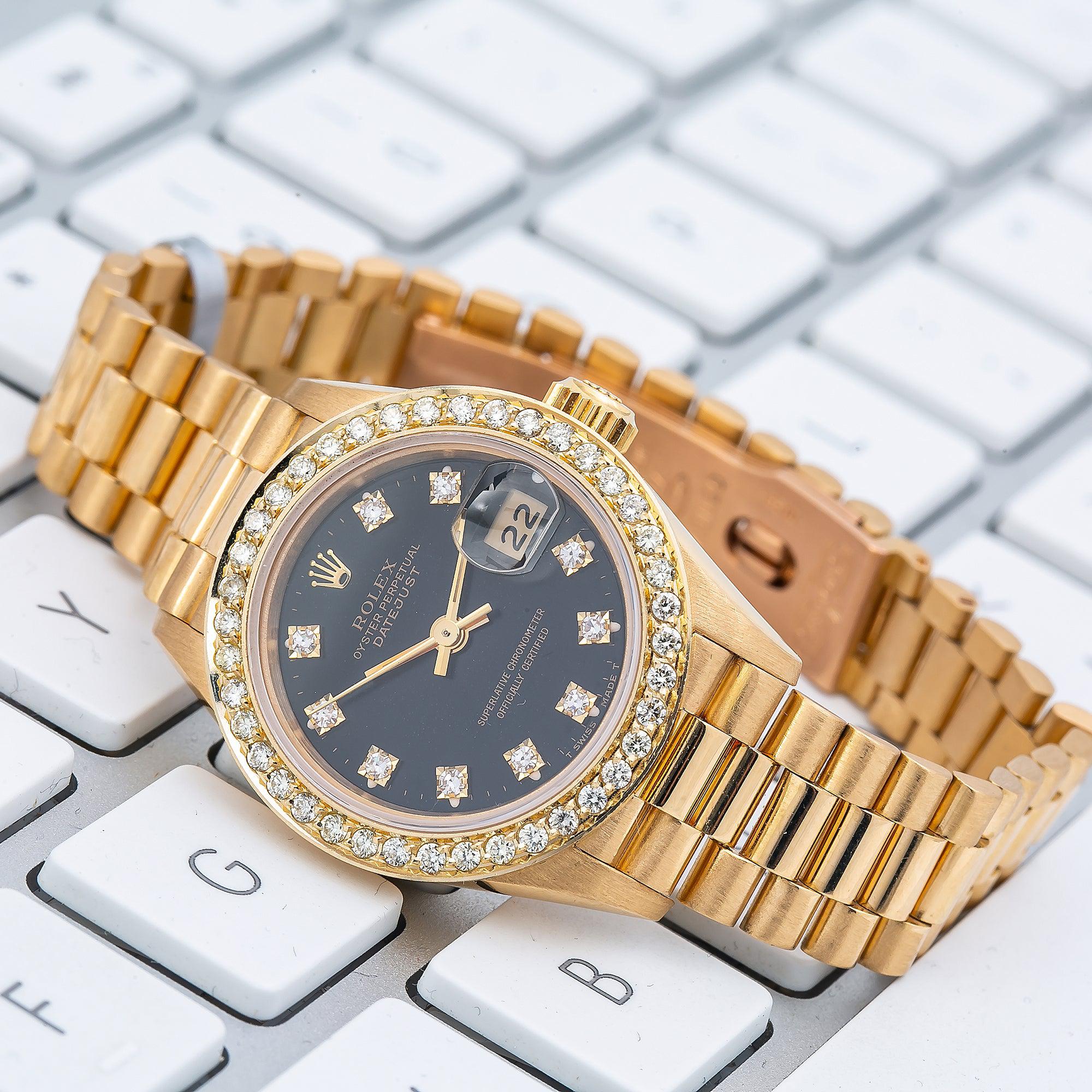 Rolex Datejust 26MM 69178 Black Diamond Dial Diamond Bezel 18K Yellow Gold President Bracelet