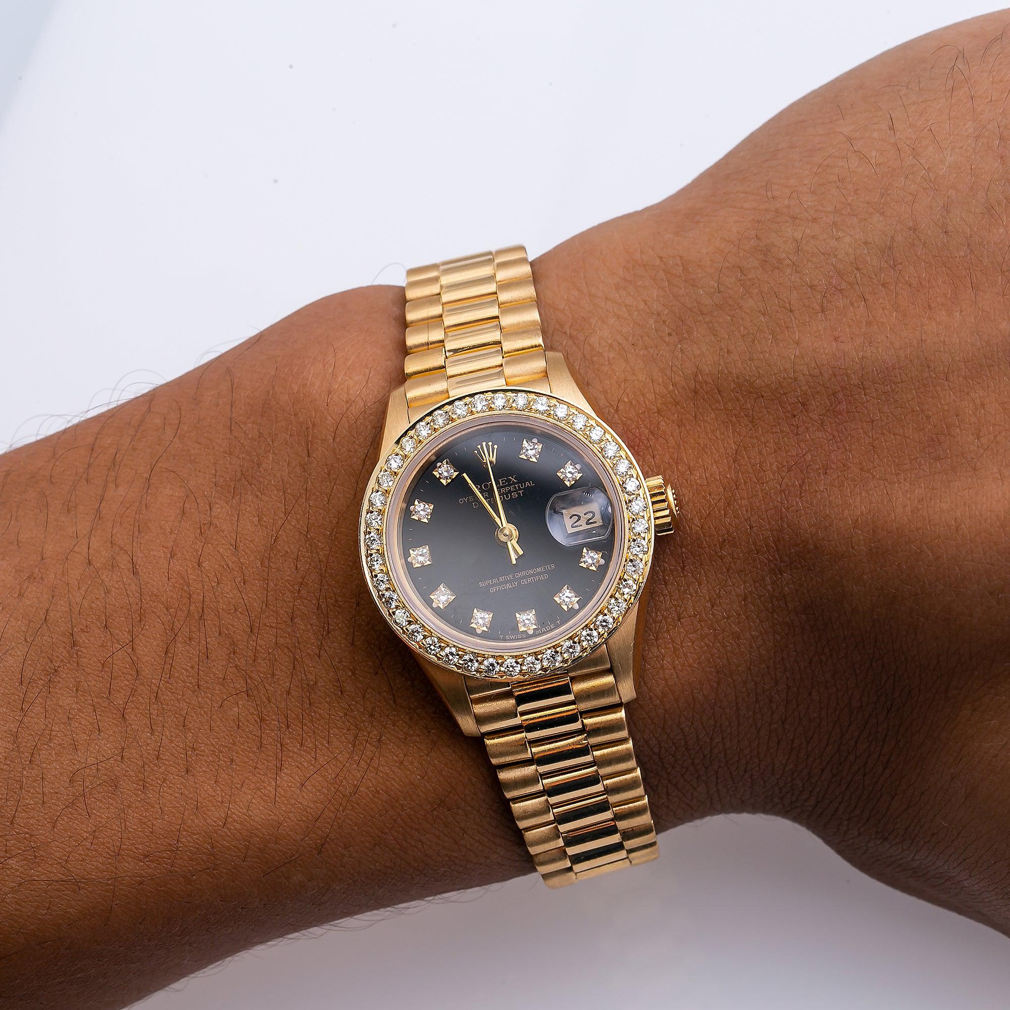 Rolex Datejust 26MM 69178 Black Diamond Dial Diamond Bezel 18K Yellow Gold President Bracelet